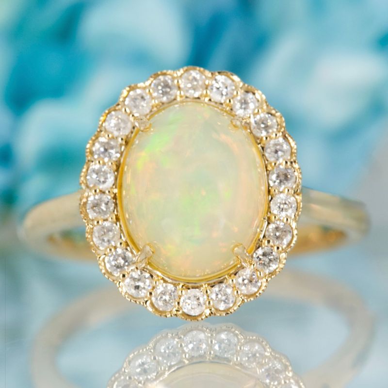 9ct Yellow Gold Oval Shaped Opal & Round Brilliant Cut Diamond Cluster Ring