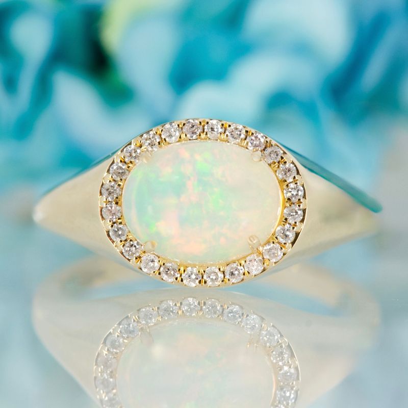 9ct Yellow Gold Oval Shaped Opal & Round Brilliant Cut Diamond Horizontal Cluster Ring