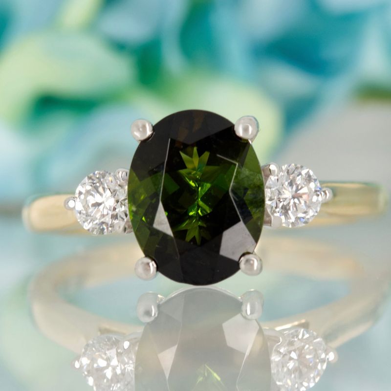 18ct Yellow Gold & Platinum Oval Cut Green Tourmaline & Round Brilliant Cut Diamond Trilogy Ring