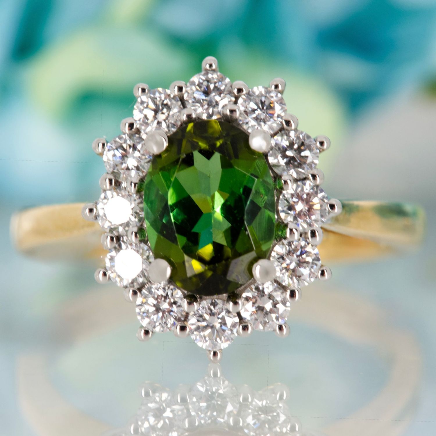 18ct Yellow Gold & Platinum Oval Cut Green Tourmaline & Round Brilliant Cut Diamond Cluster Ring