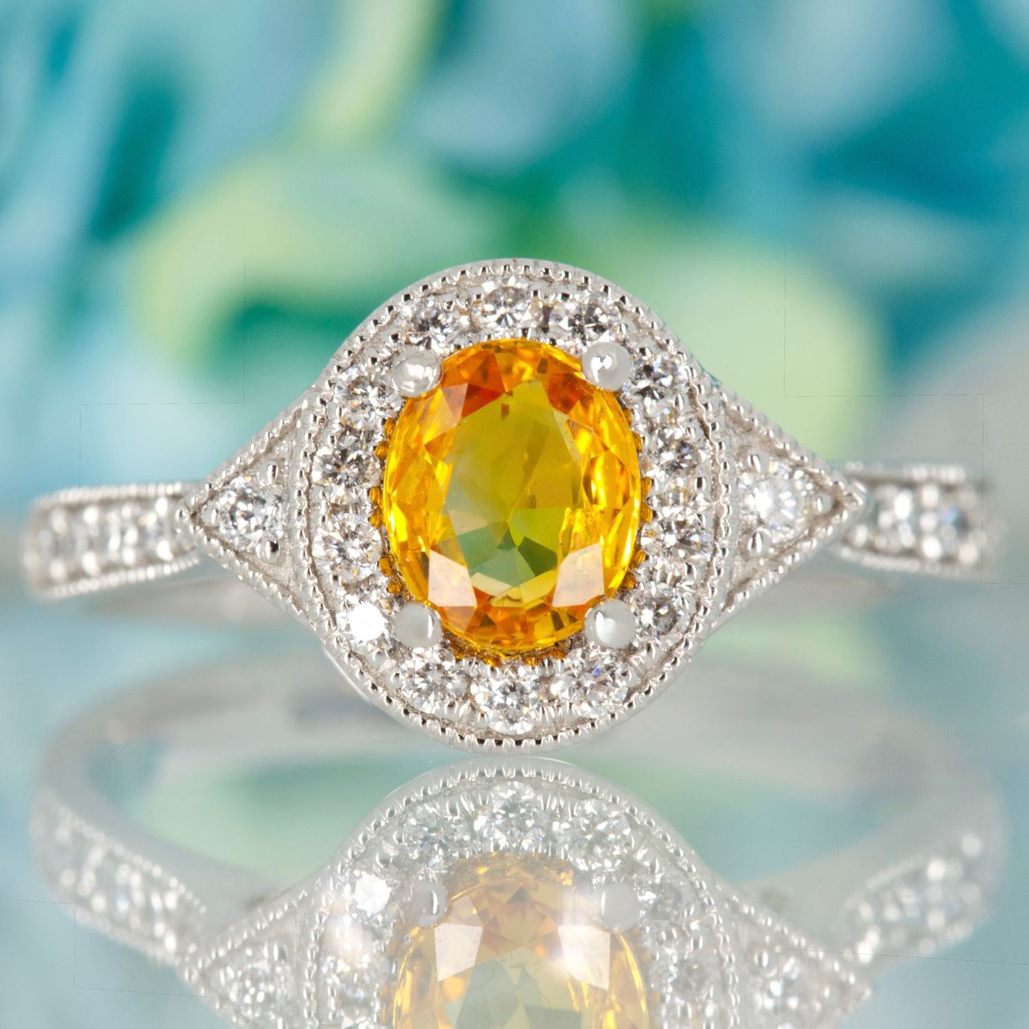 Platinum Oval Cut Yellow Sapphire & Round Brilliant Cut Diamond Halo Cluster Ring