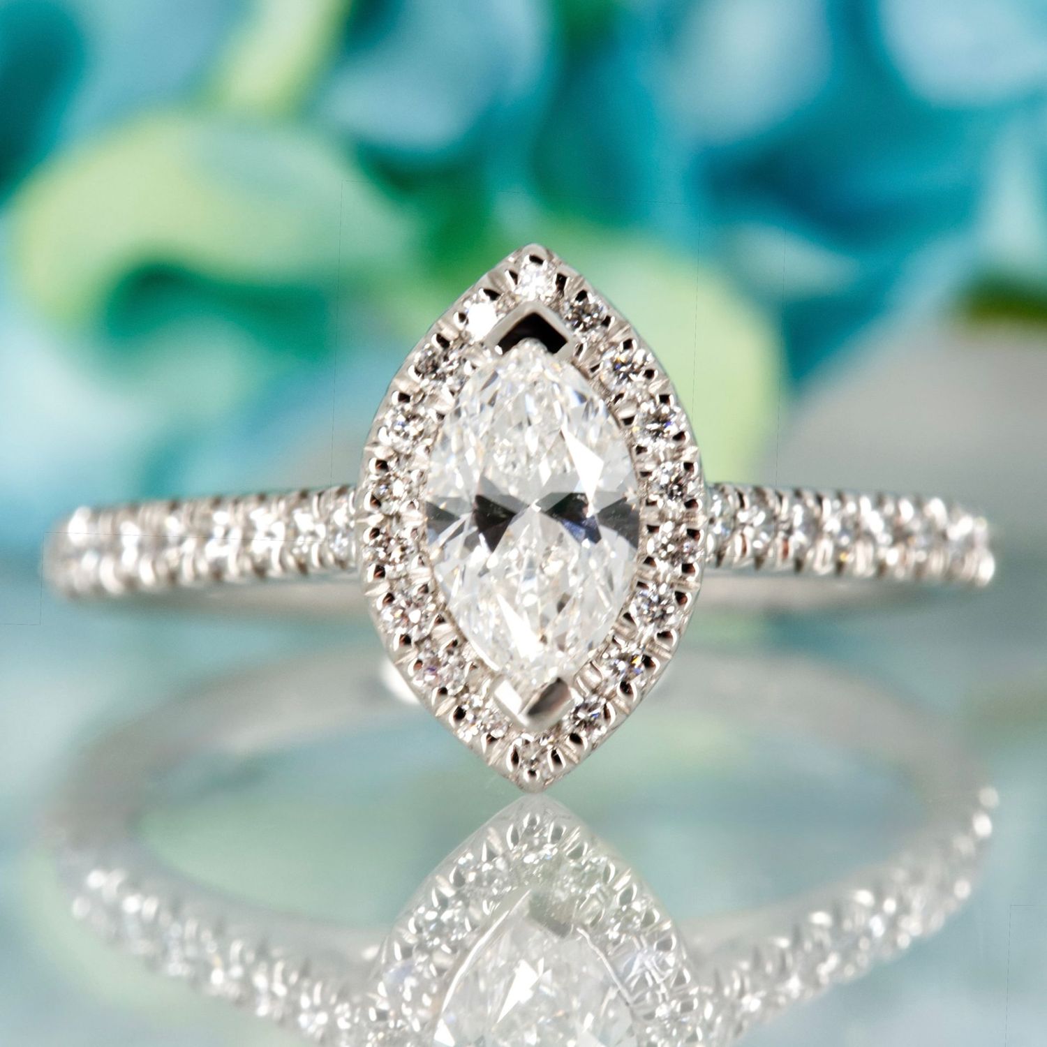 Platinum GIA Certified Marquise Cut Diamond & Round Brilliant Cut Diamond Halo Cluster Ring Platinum GIA Certified Marquise Cut Diamond & Round Brilliant Cut Diamond Halo Cluster Ring