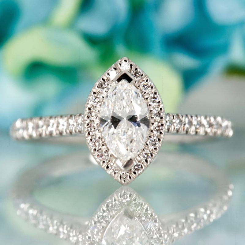 Platinum GIA Certified Marquise Cut Diamond & Round Brilliant Cut Diamond Halo Cluster Ring