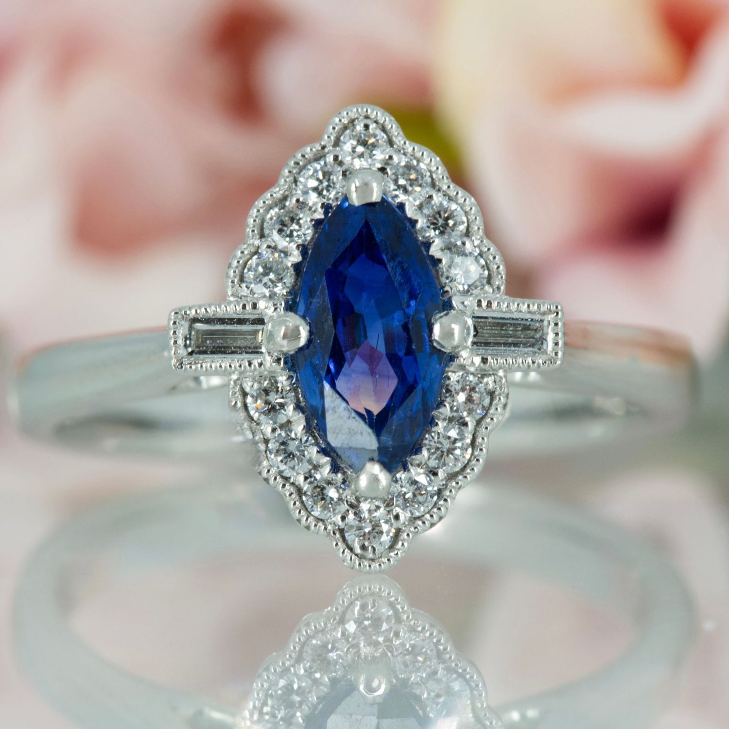 Platinum Marquise Cut Sapphire & Baguette and Round Brilliant Cut Diamond Cluster Ring
