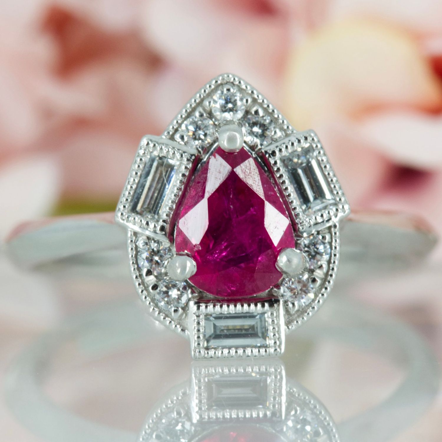 Platinum Pear Cut Ruby & Baguette and Round Brilliant Cut Diamond Cluster Ring