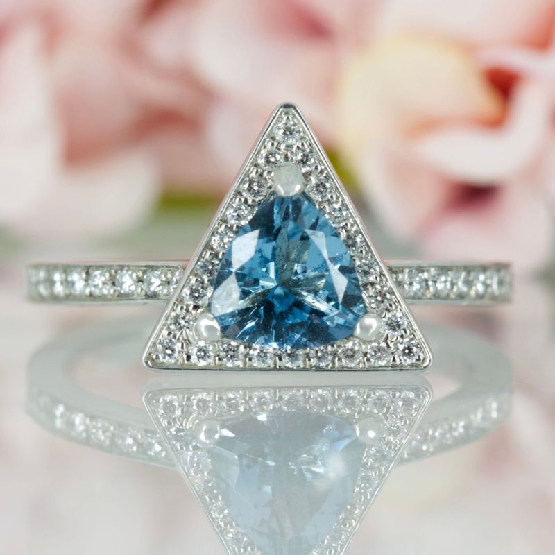 Platinum Trilliant Cut Aquamarine & Round Brilliant Cut Diamond Halo Cluster Ring