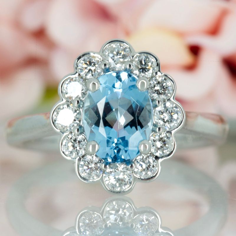 Platinum Oval Cut Aquamarine & Round Brilliant Cut Diamond Cluster Ring