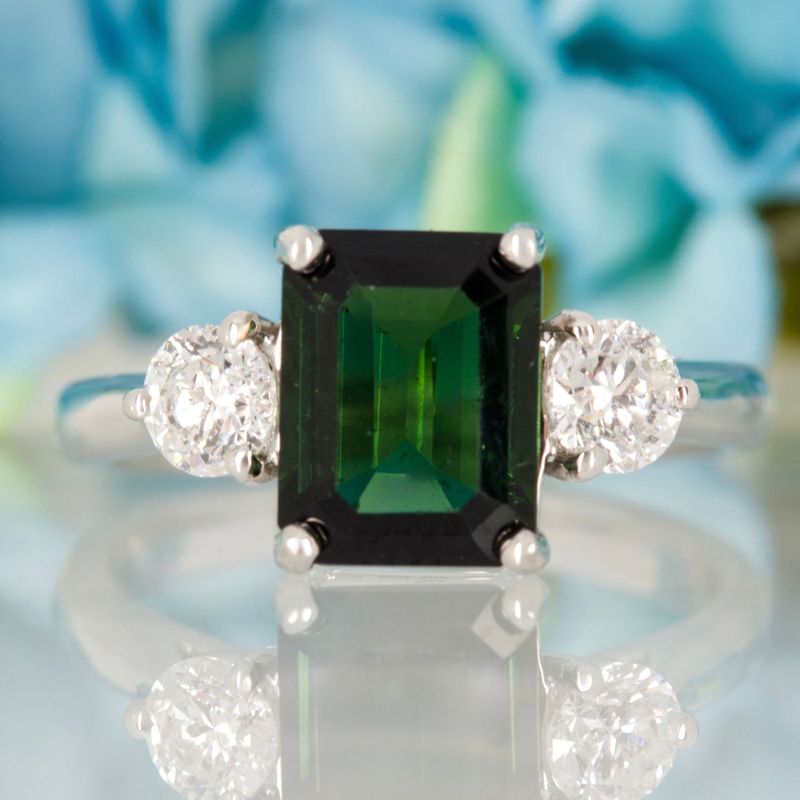Platinum Octagonal Cut Green Tourmaline & Round Brilliant Cut Diamond Trilogy Ring