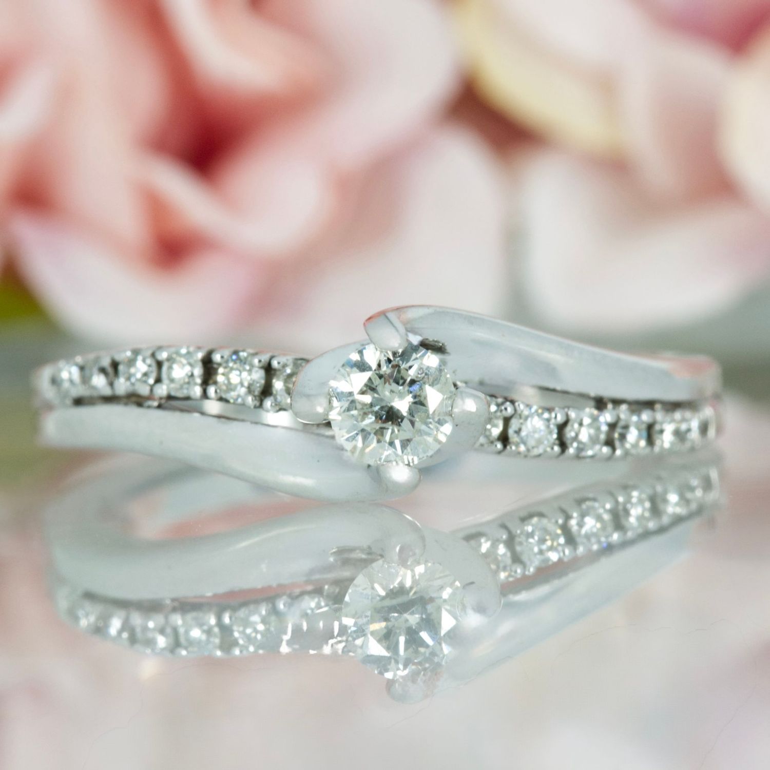 Pre-Loved 18ct White Gold Round Brilliant Cut Diamond Solitaire Ring with Diamond Set Twisted Shoulders