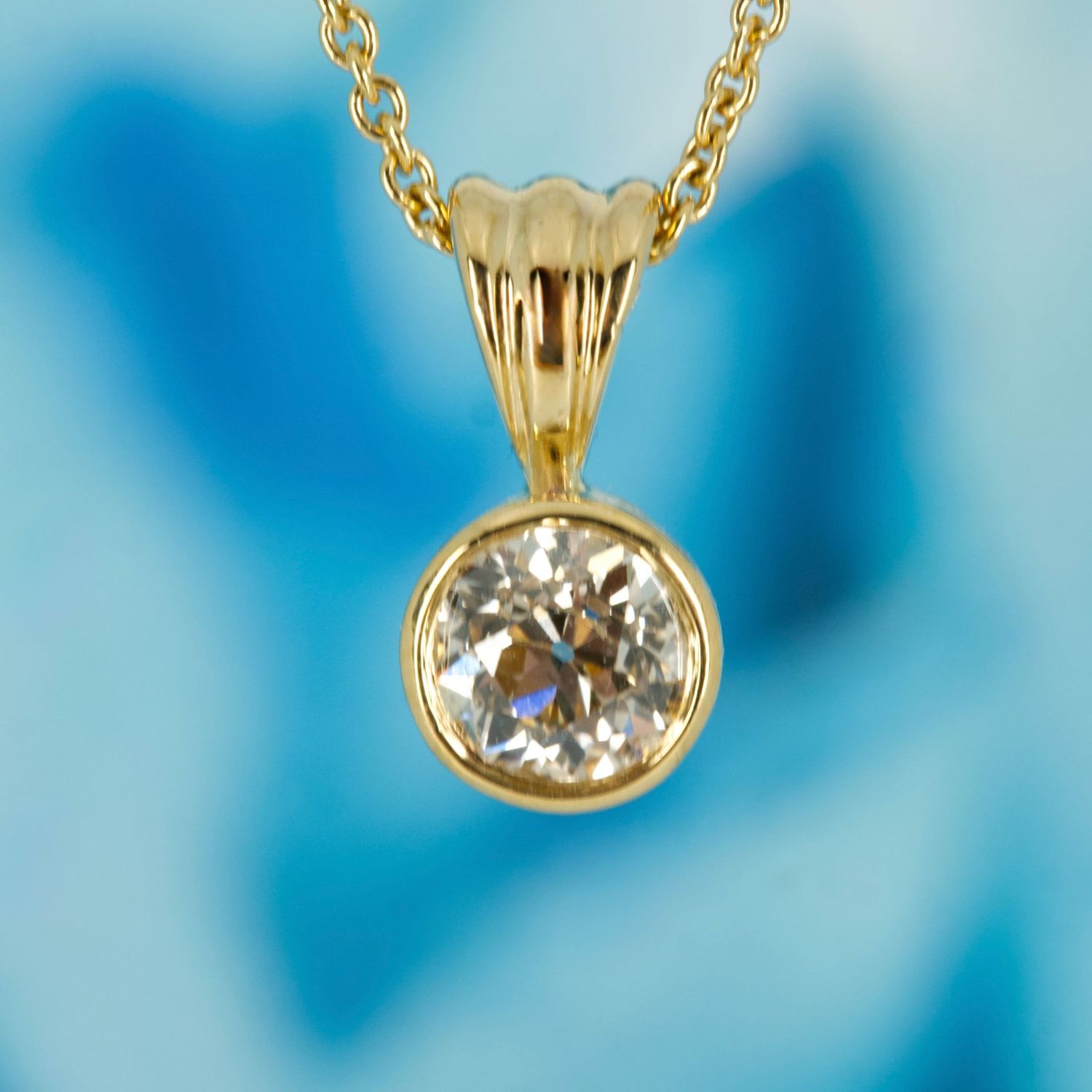 Pre-Loved 18ct Yellow Gold 0.51ct Round Brilliant Cut Diamond Solitaire Rub-Over Set Pendant & Chain