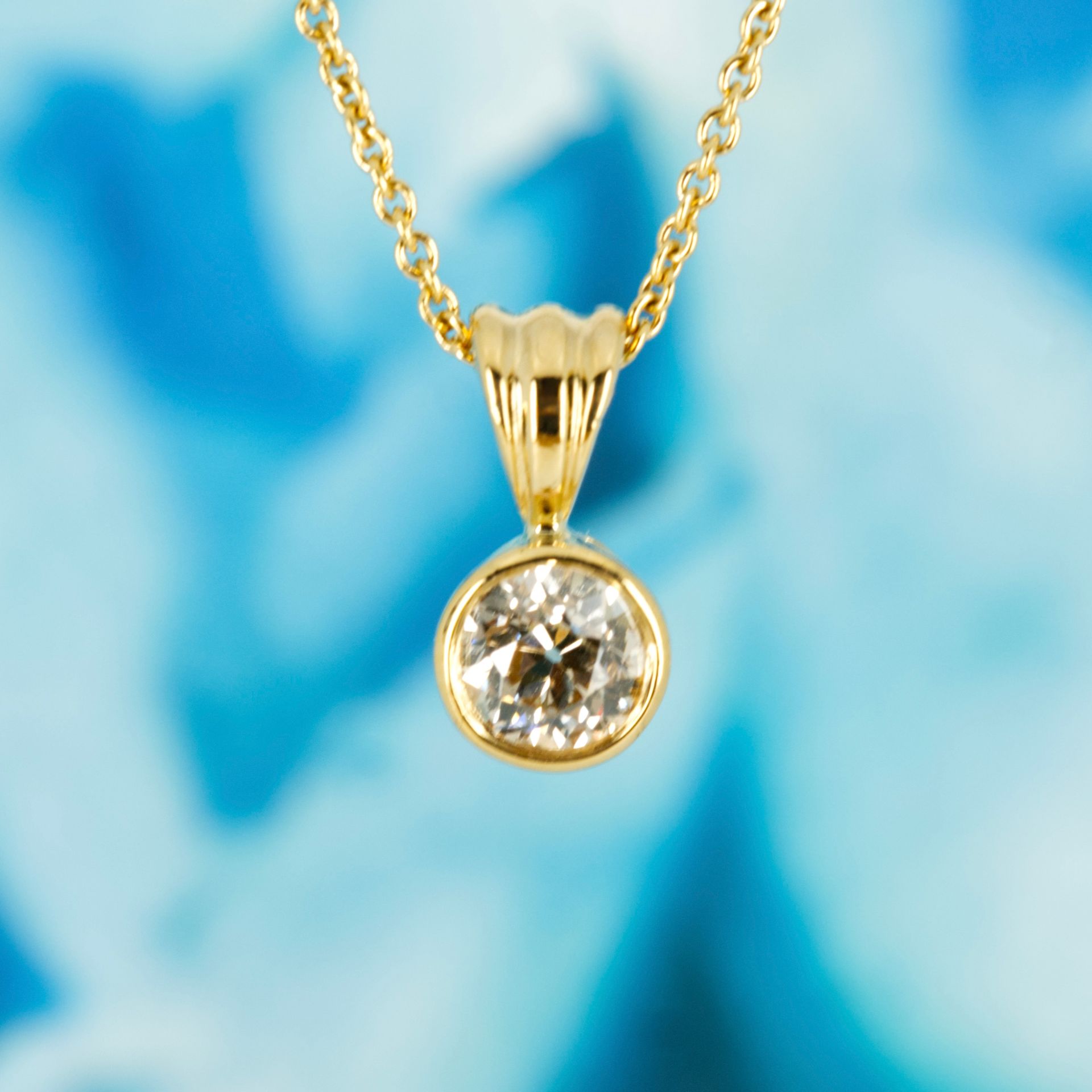 Pre-Loved 18ct Yellow Gold 0.51ct Round Brilliant Cut Diamond Solitaire Rub-Over Set Pendant & Chain