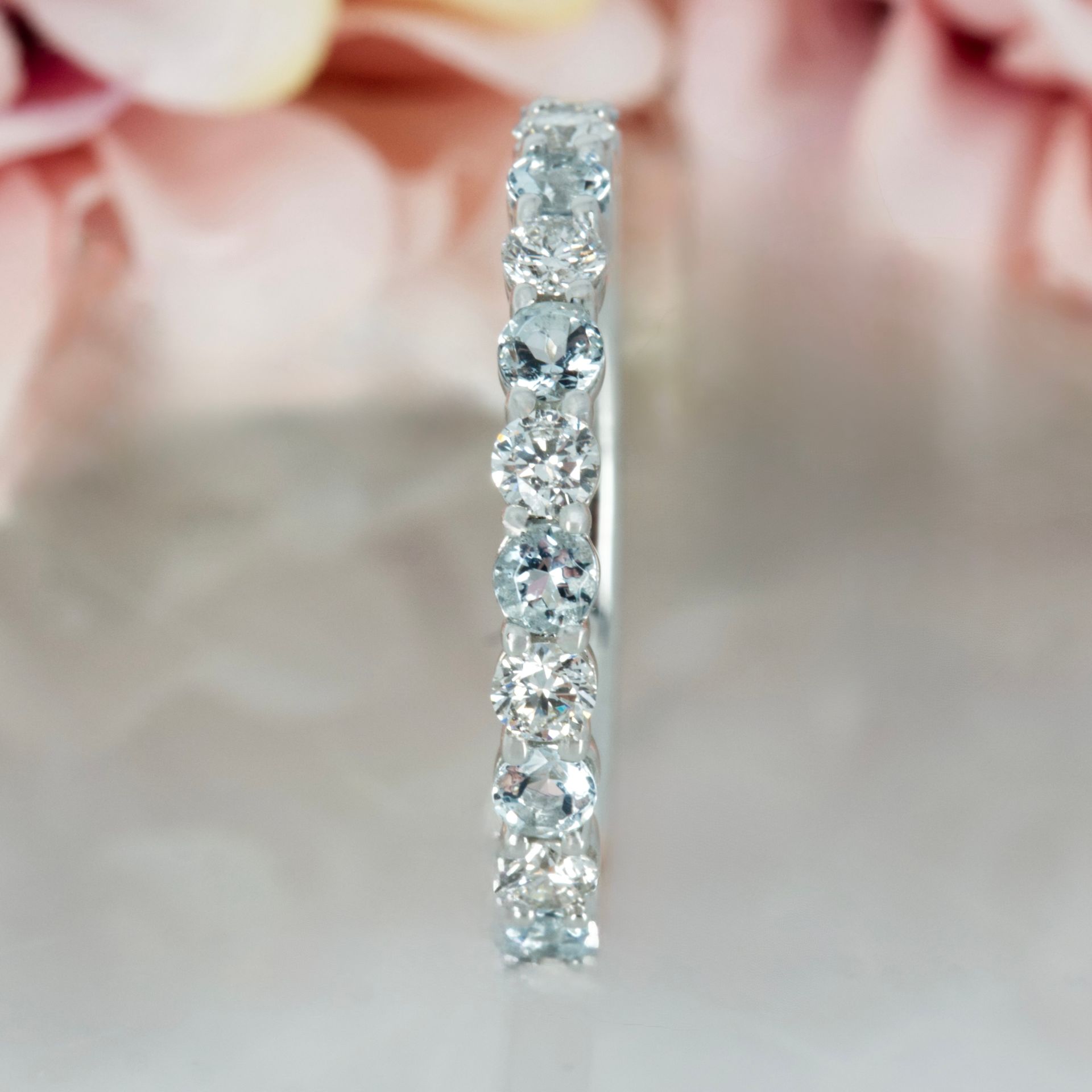 Platinum Round Cut Aquamarine & Round Brilliant Cut Diamond Claw Set Half Eternity Ring