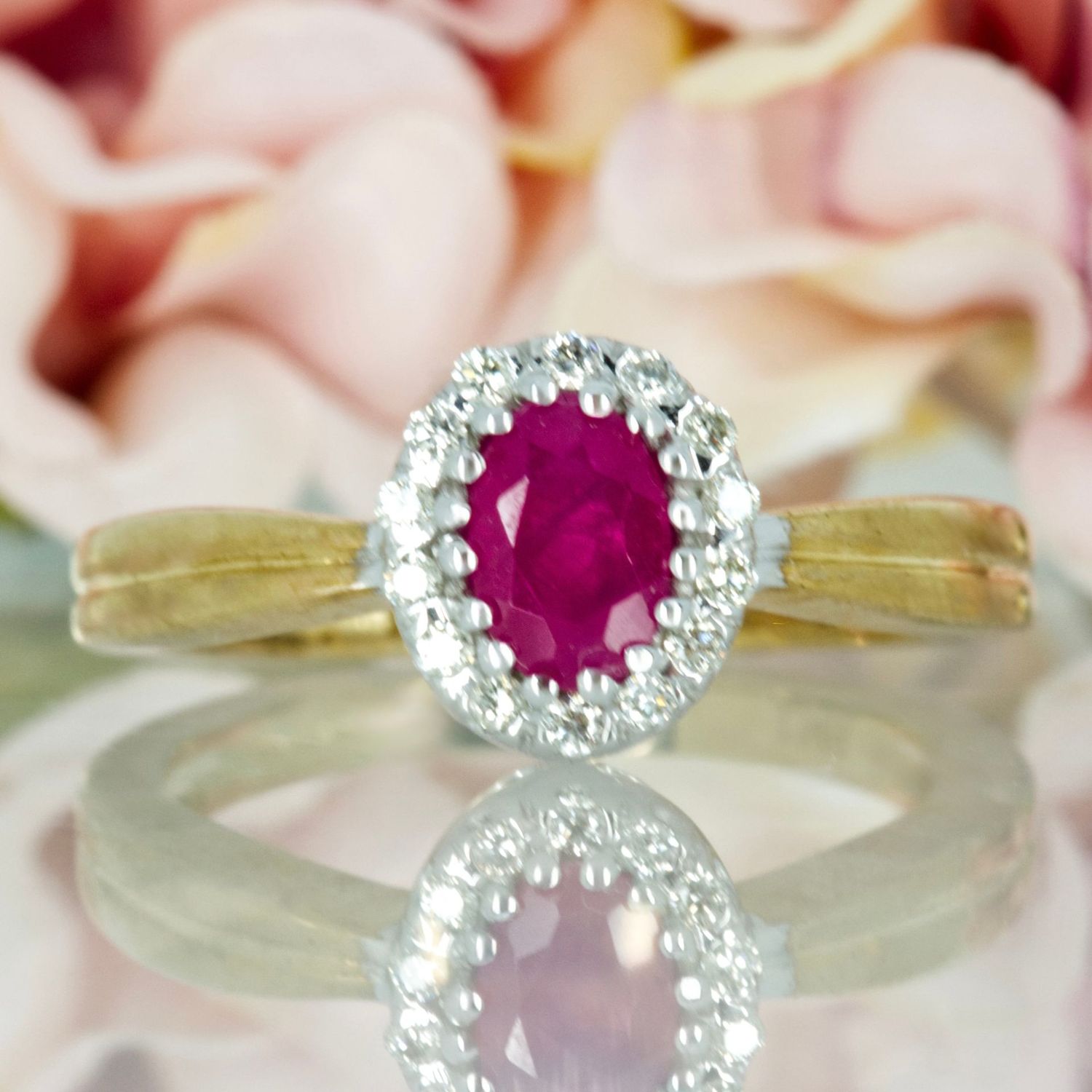 9ct Yellow Gold Oval Cut Ruby & Round Brilliant Cut Diamond Halo Cluster Ring