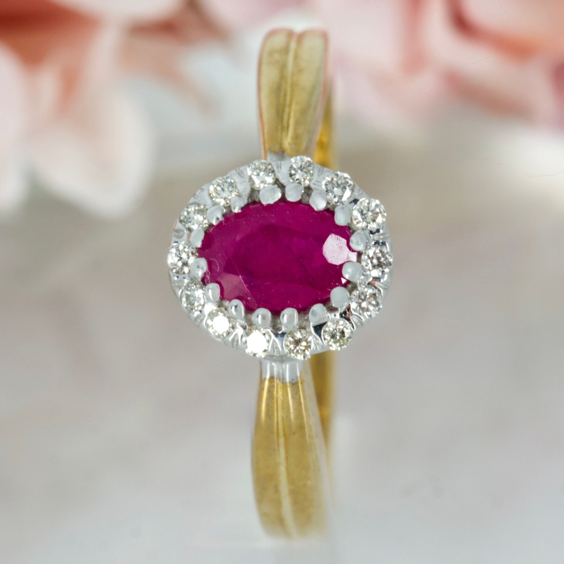 9ct Yellow Gold Oval Cut Ruby & Round Brilliant Cut Diamond Halo Cluster Ring