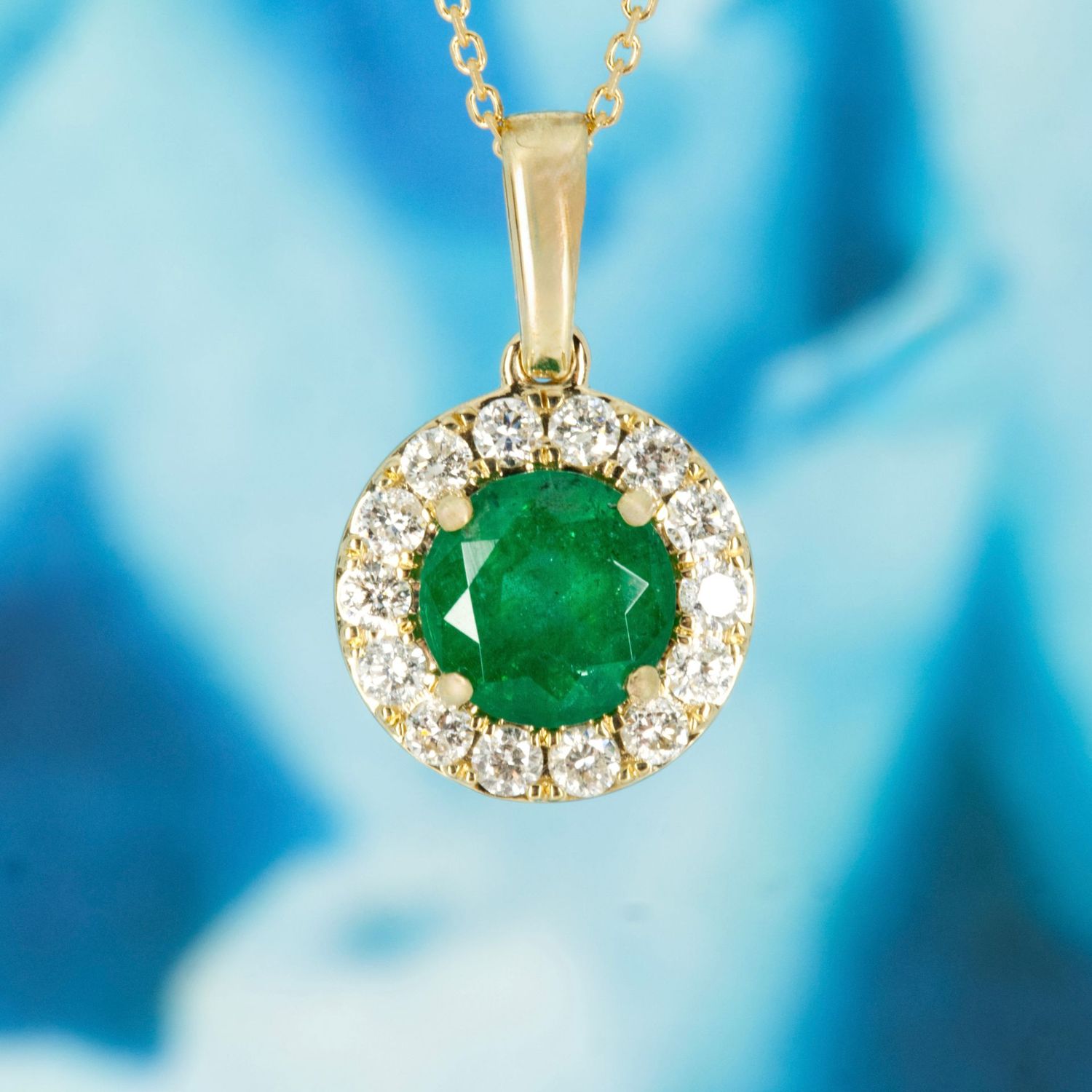 9ct Yellow Gold Round Cut Emerald & Round Brilliant Cut Diamond Halo Cluster Pendant & Chain 9ct Yellow Gold Round Cut Emerald & Round Brilliant Cut Diamond Halo Cluster Pendant & Chain