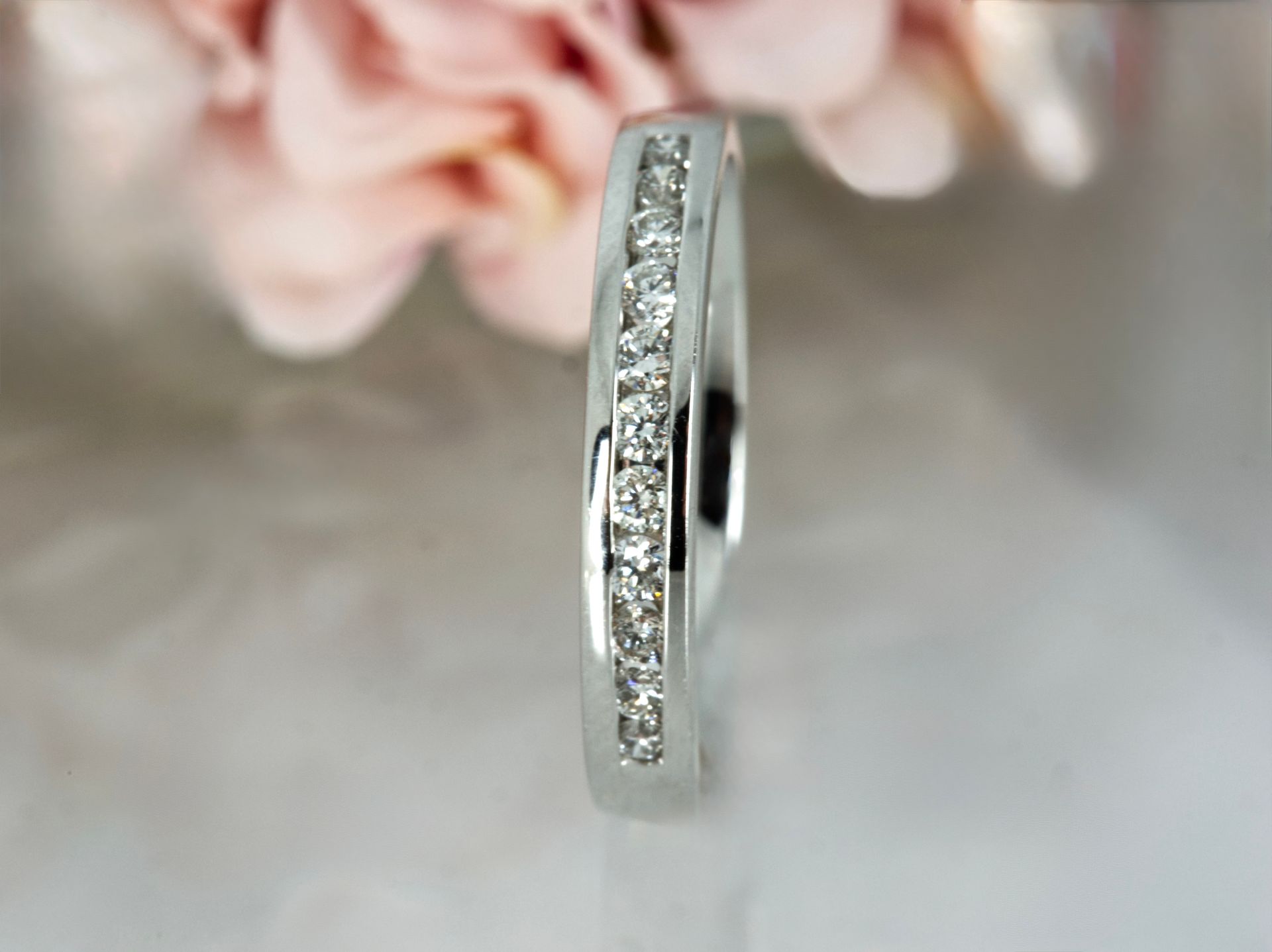 Platinum 0.25ct Round Brilliant Cut Diamond Channel Set Half Eternity Ring