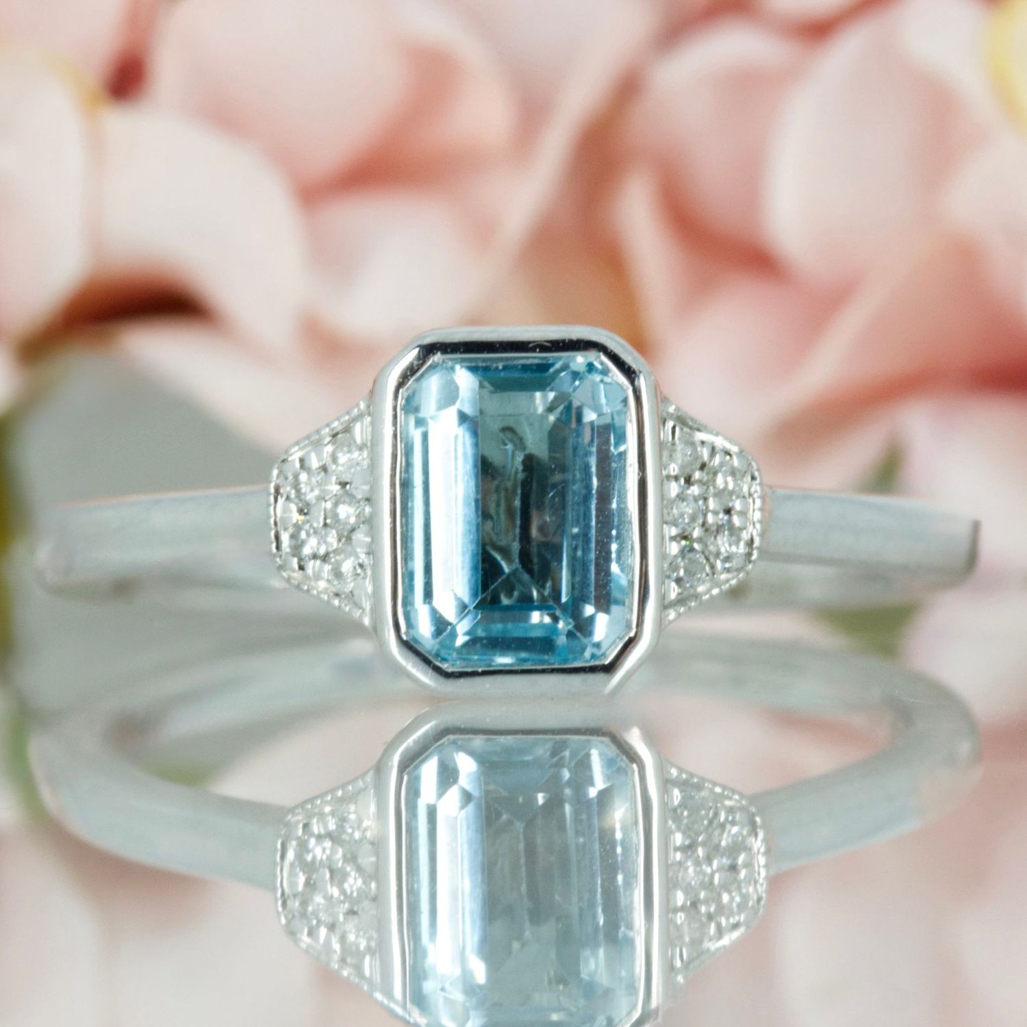 9ct White Gold Octagonal Cut Blue Topaz & Round Brilliant Cut Diamond Ring