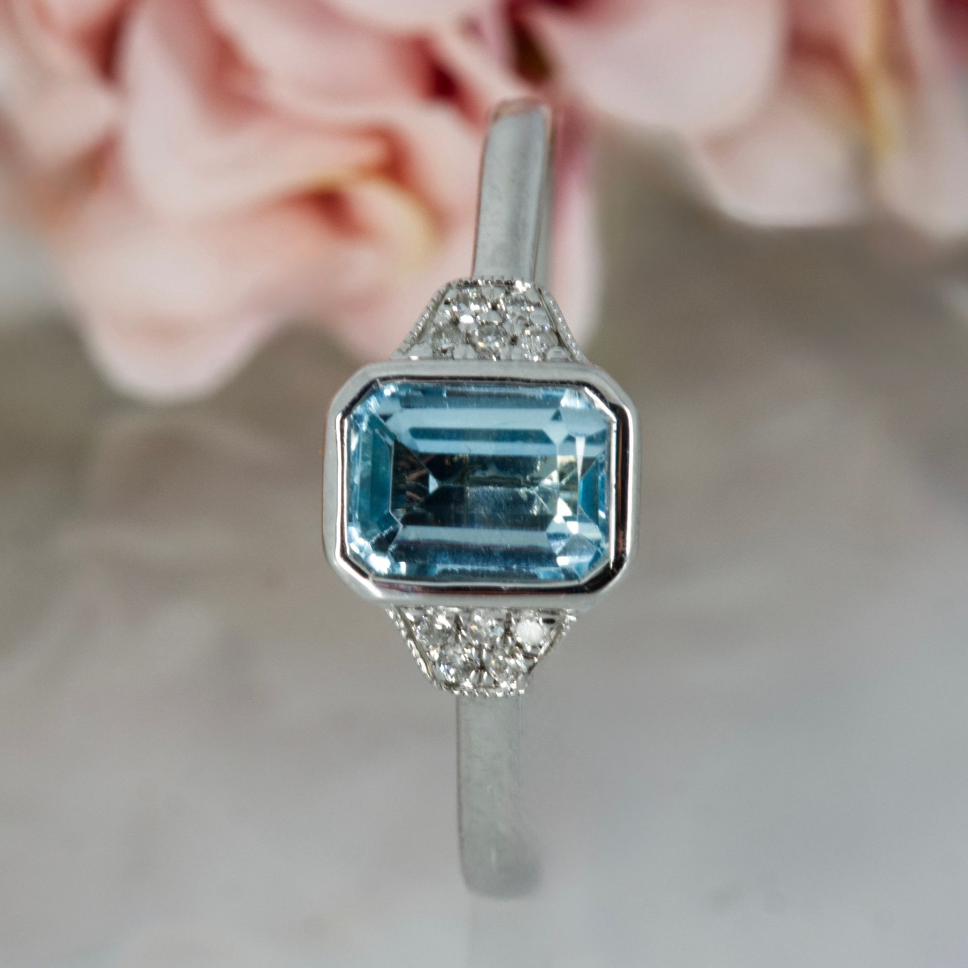9ct White Gold Octagonal Cut Blue Topaz & Round Brilliant Cut Diamond Ring