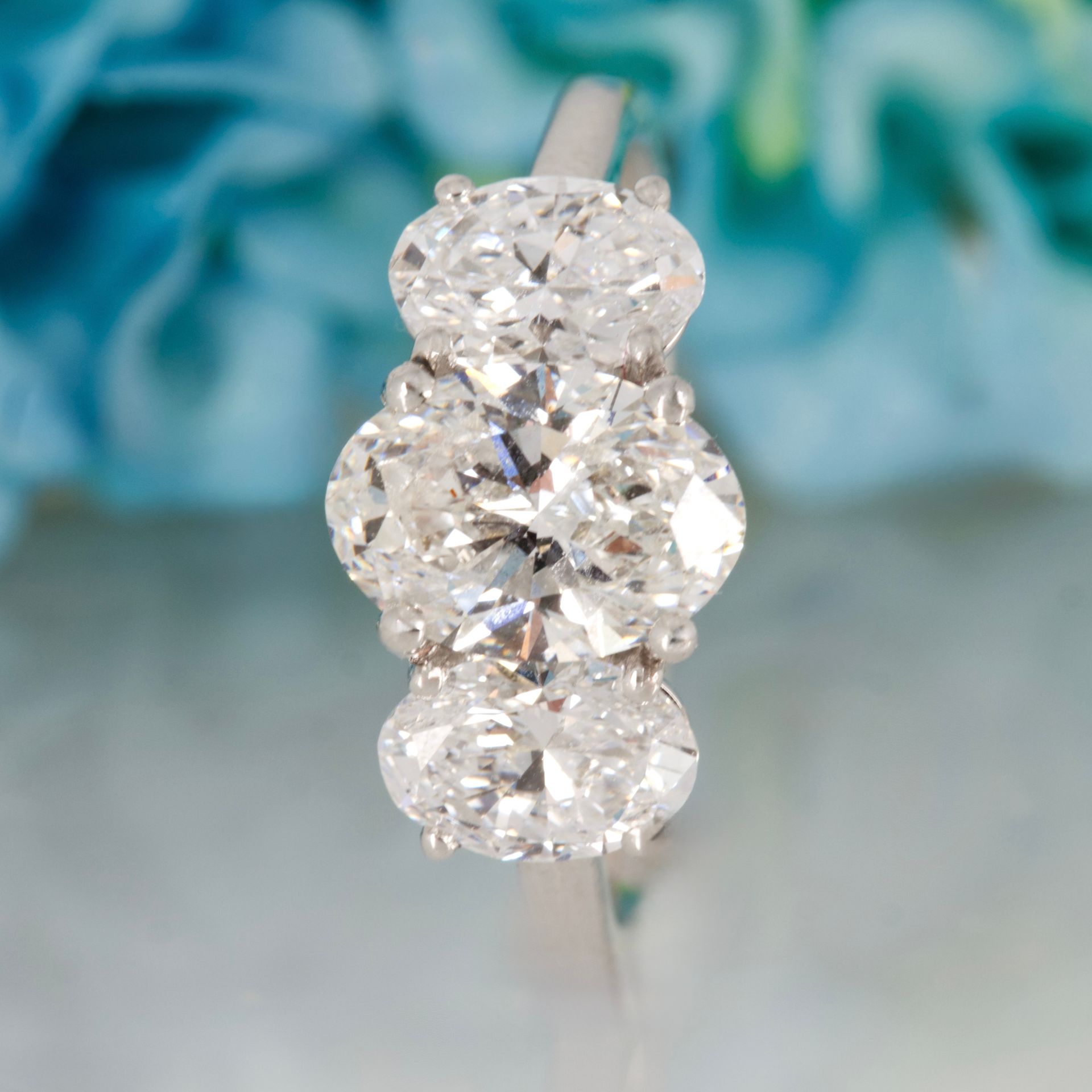 9ct White Gold 3.08ct Oval Cut Lab Grown Diamond Trilogy Ring