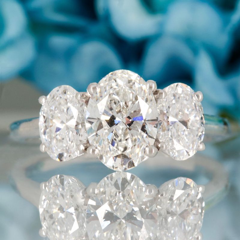9ct White Gold 3.07ct Oval Cut Lab Grown Diamond Trilogy Ring