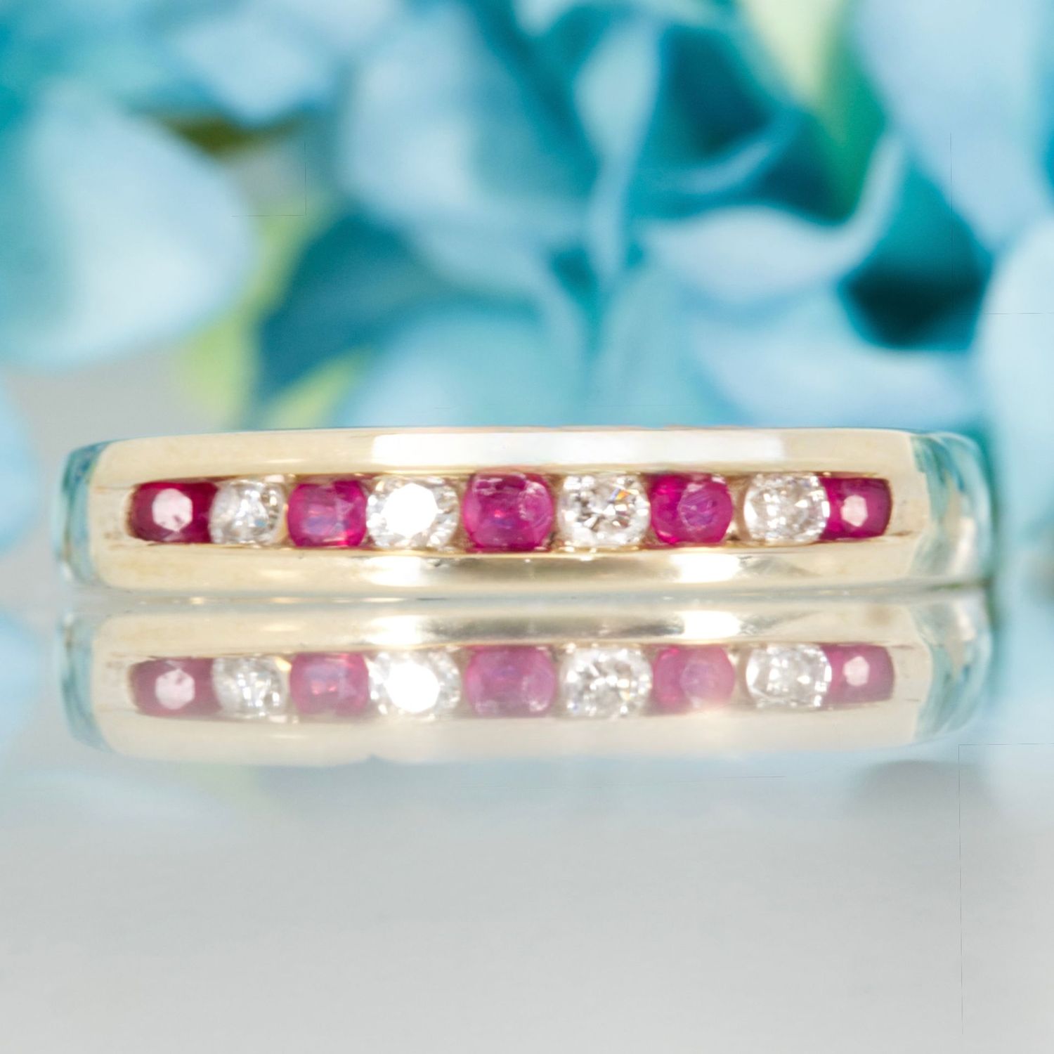 Pre-Loved 9ct Yellow Gold Round Cut Ruby & Round Brilliant Cut Diamond Channel Set Half Eternity Ring