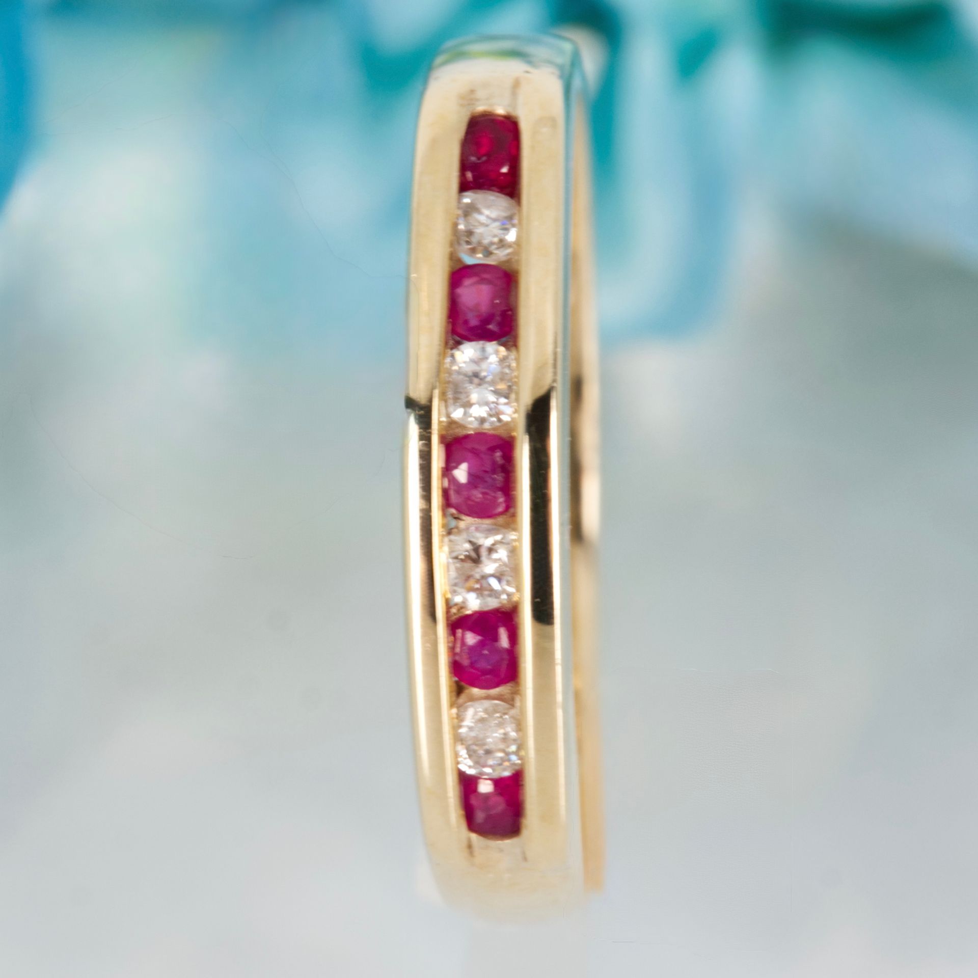 Pre-Loved 9ct Yellow Gold Round Cut Ruby & Round Brilliant Cut Diamond Channel Set Half Eternity Ring