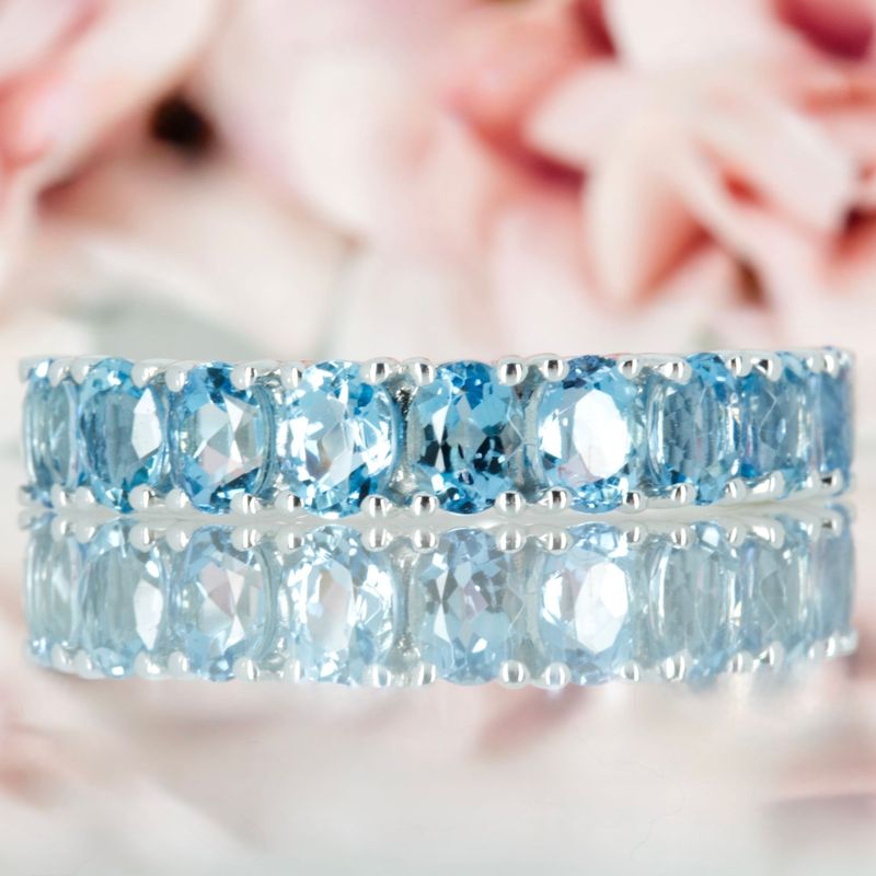 9ct White Gold Oval Cut Aquamarine Nine Stone Half Eternity Ring