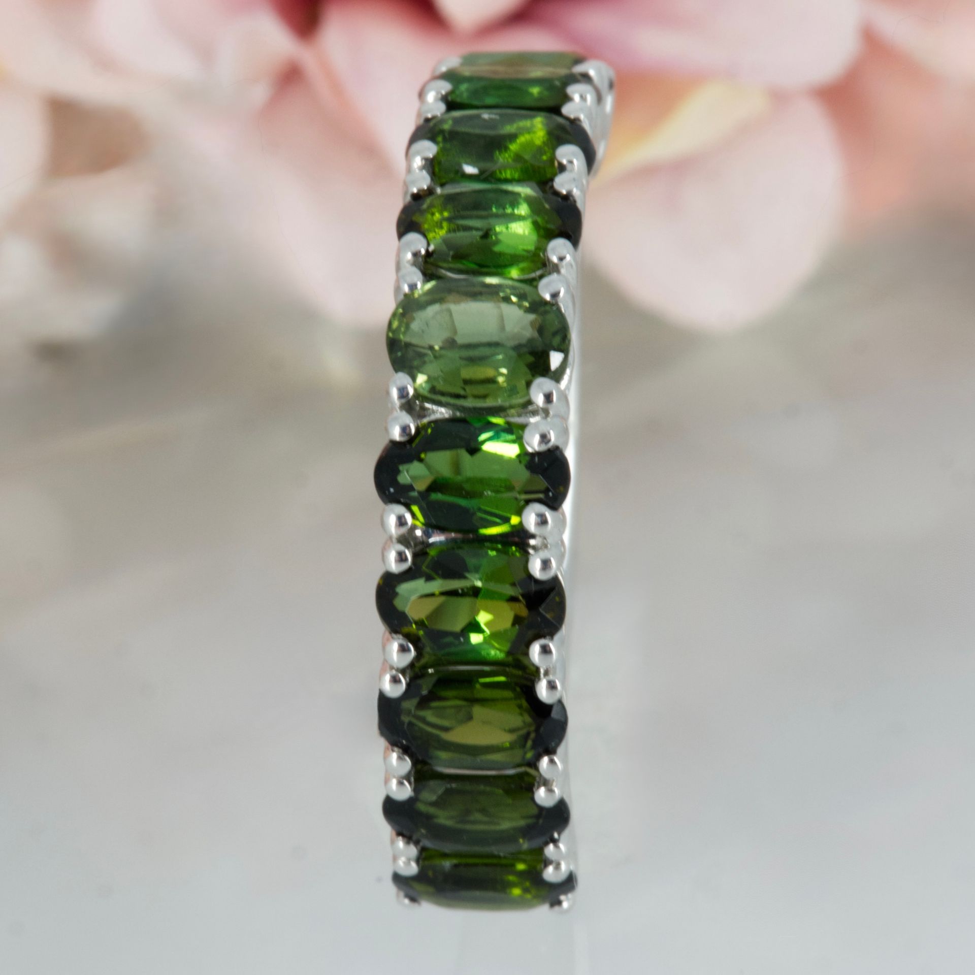 9ct White Gold Oval Cut Green Tourmaline Ten-Stone Half Eternity Ring