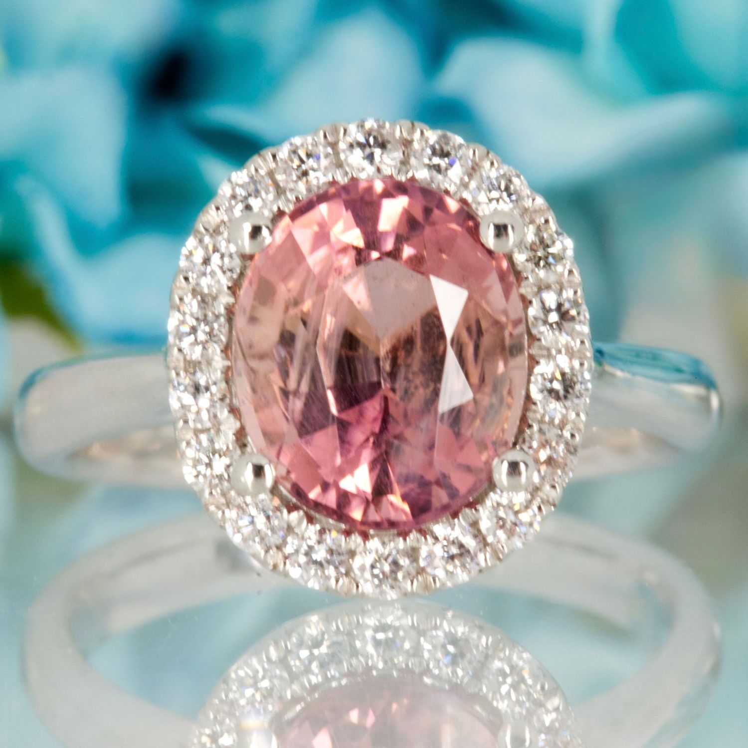 Platinum Oval Cut Pink Tourmaline & Round Brilliant Cut Diamond Halo Cluster Ring Platinum Oval Cut Pink Tourmaline & Round Brilliant Cut Diamond Halo Cluster Ring