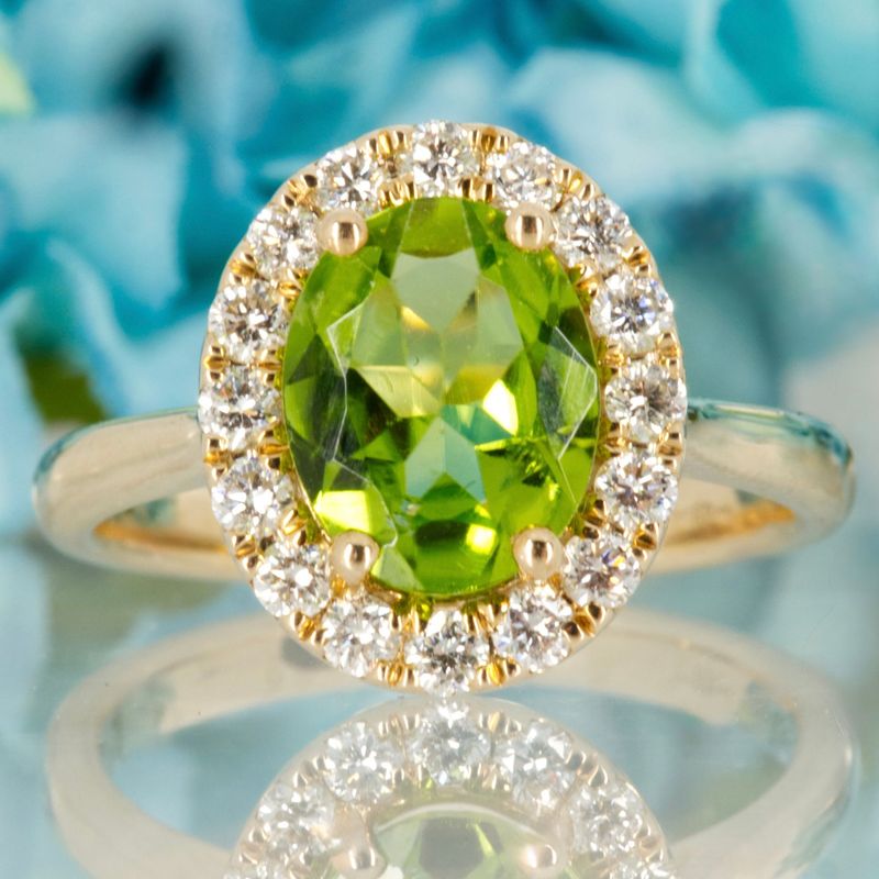 9ct Yellow Gold Oval Cut Peridot & Round Brilliant Cut Diamond Halo Cluster Ring