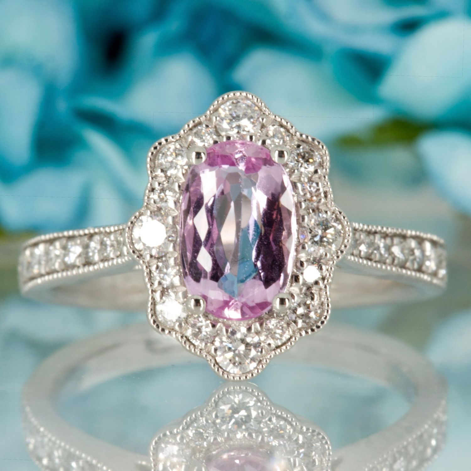 Platinum Oval Cut Pink Topaz & Round Brilliant Cut Diamond Cluster Ring
