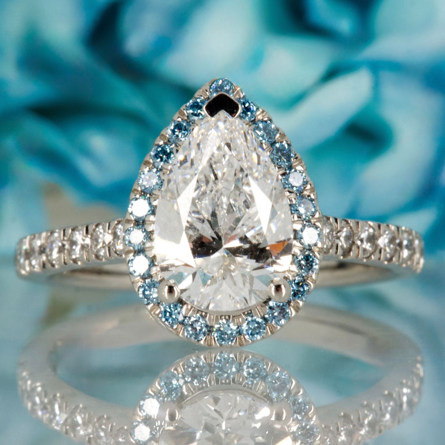 Platinum Pear & Round Brilliant Cut Lab Grown Diamond Halo Cluster Ring