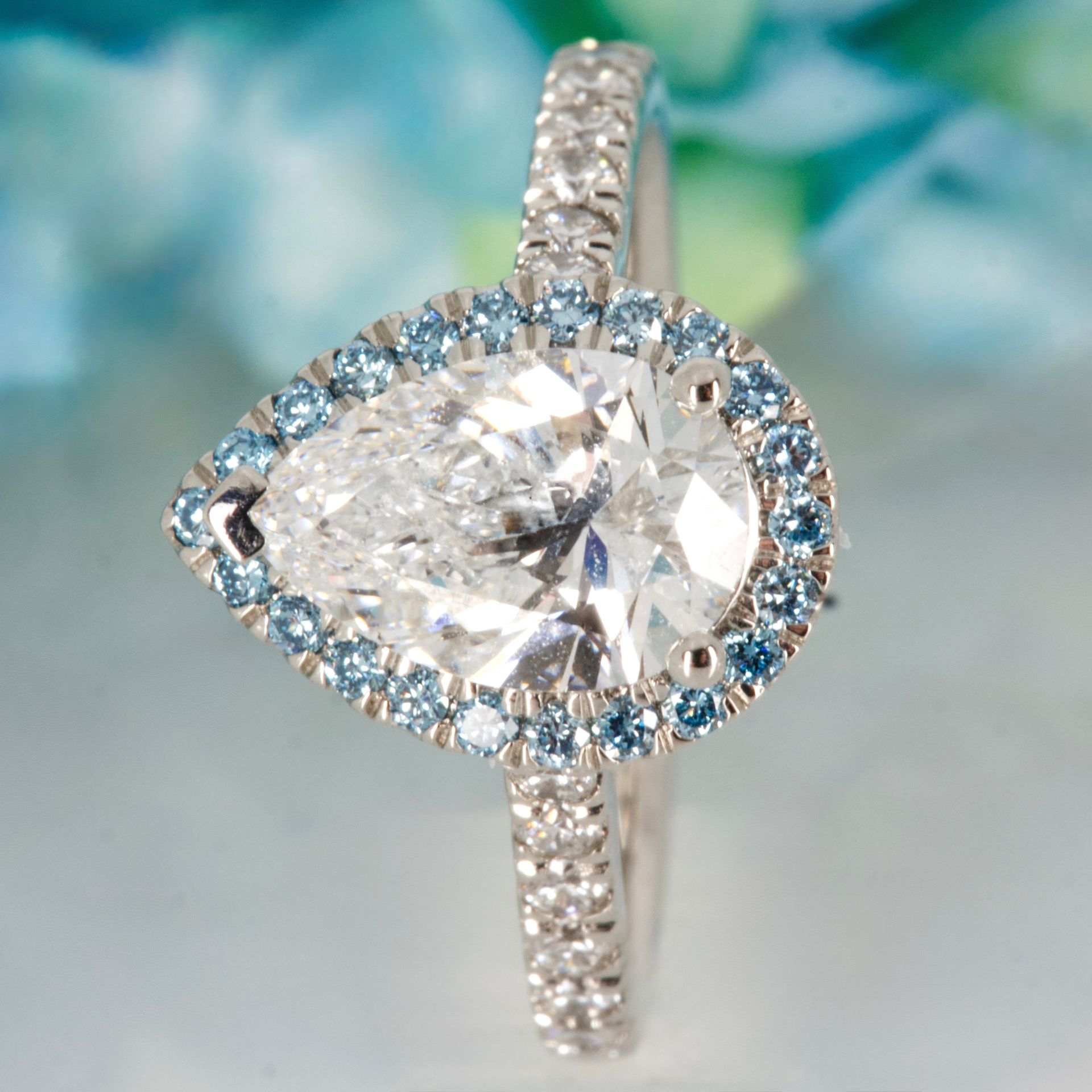 Platinum Pear & Round Brilliant Cut Lab Grown Diamond Halo Cluster Ring