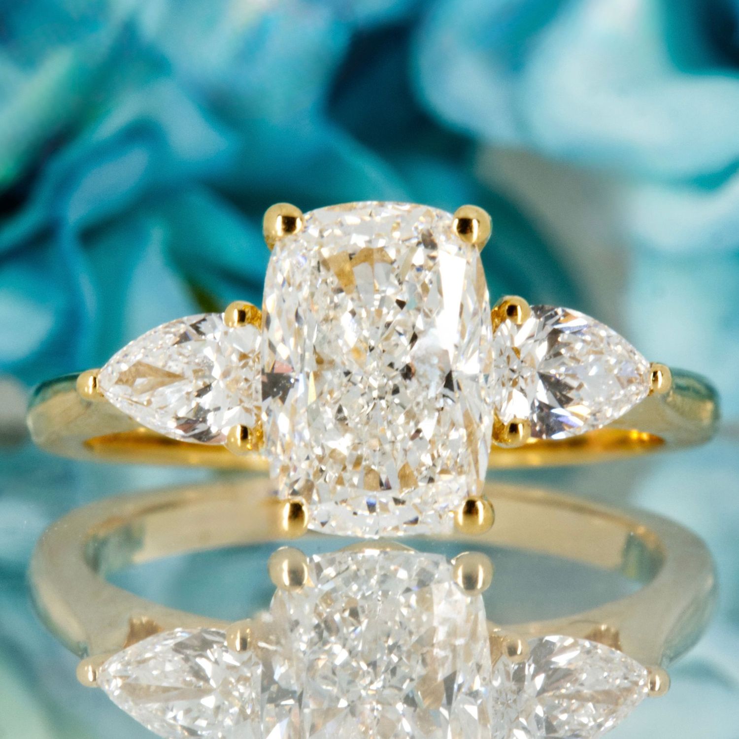 18ct Yellow Gold 2.59ct Cushion & Pear Cut Lab Grown Diamond Trilogy Ring