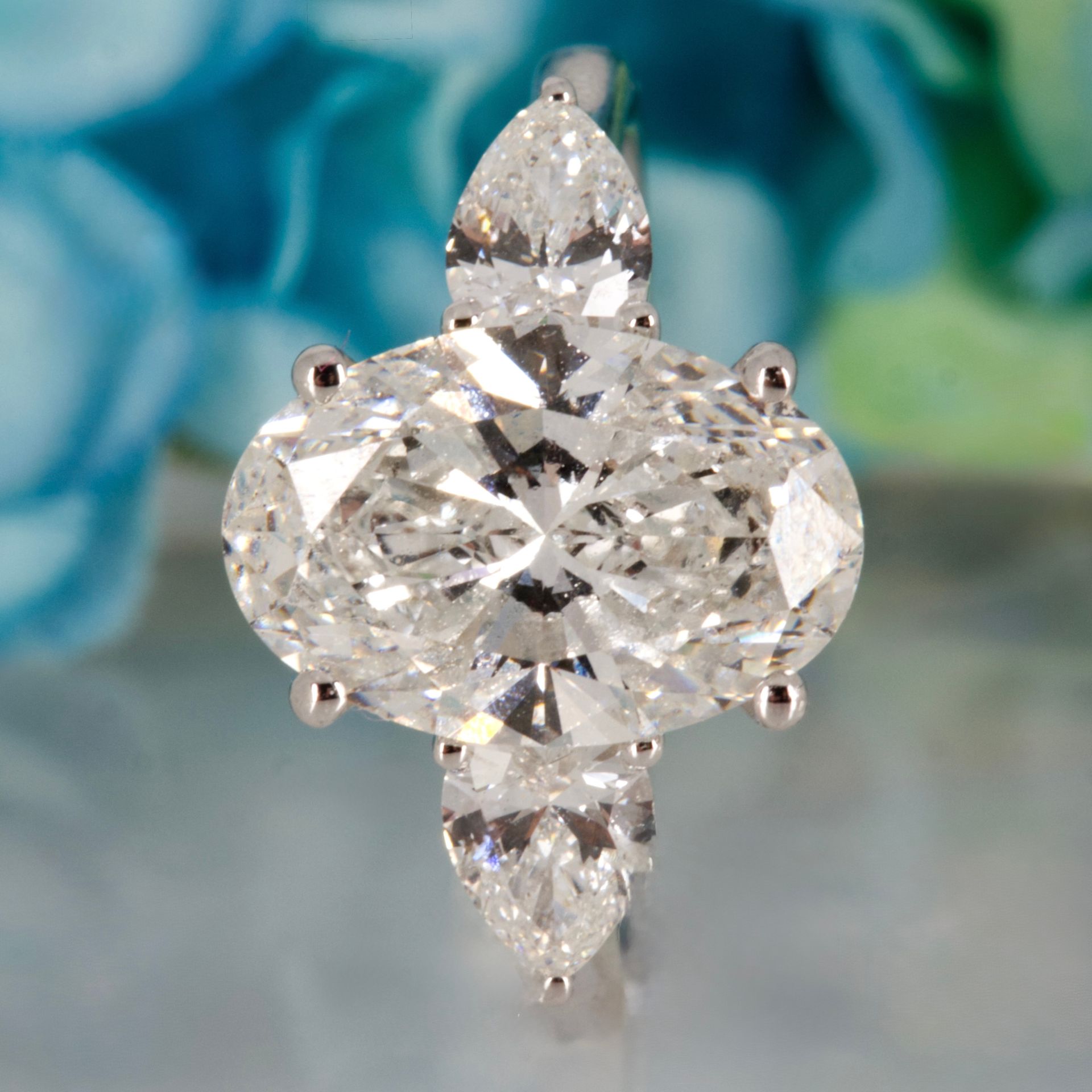 Platinum 3.69ct Oval & Pear Cut Lab Grown Diamond Trilogy Ring