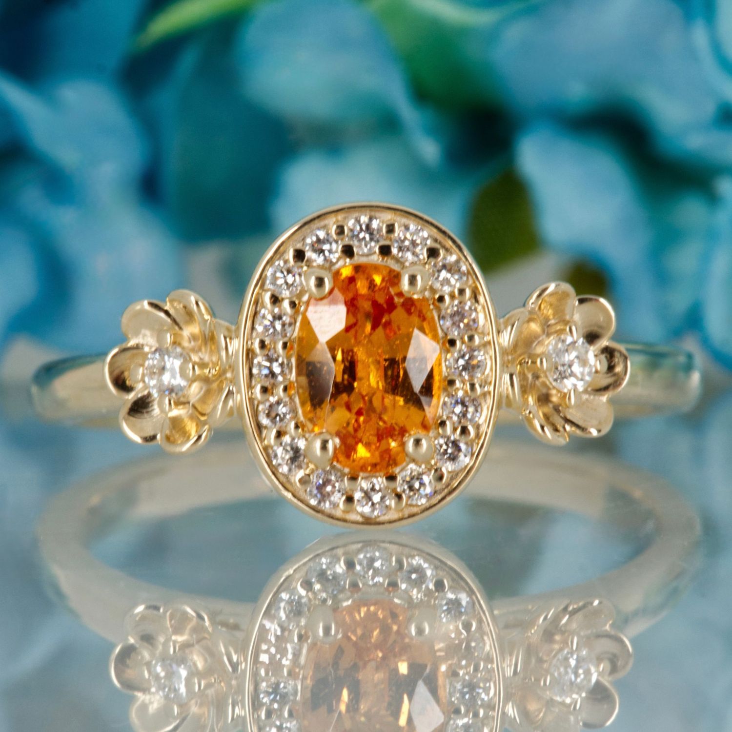9ct Yellow Gold Oval Cut Spessartite & Round Brilliant Cut Diamond Halo Cluster Ring