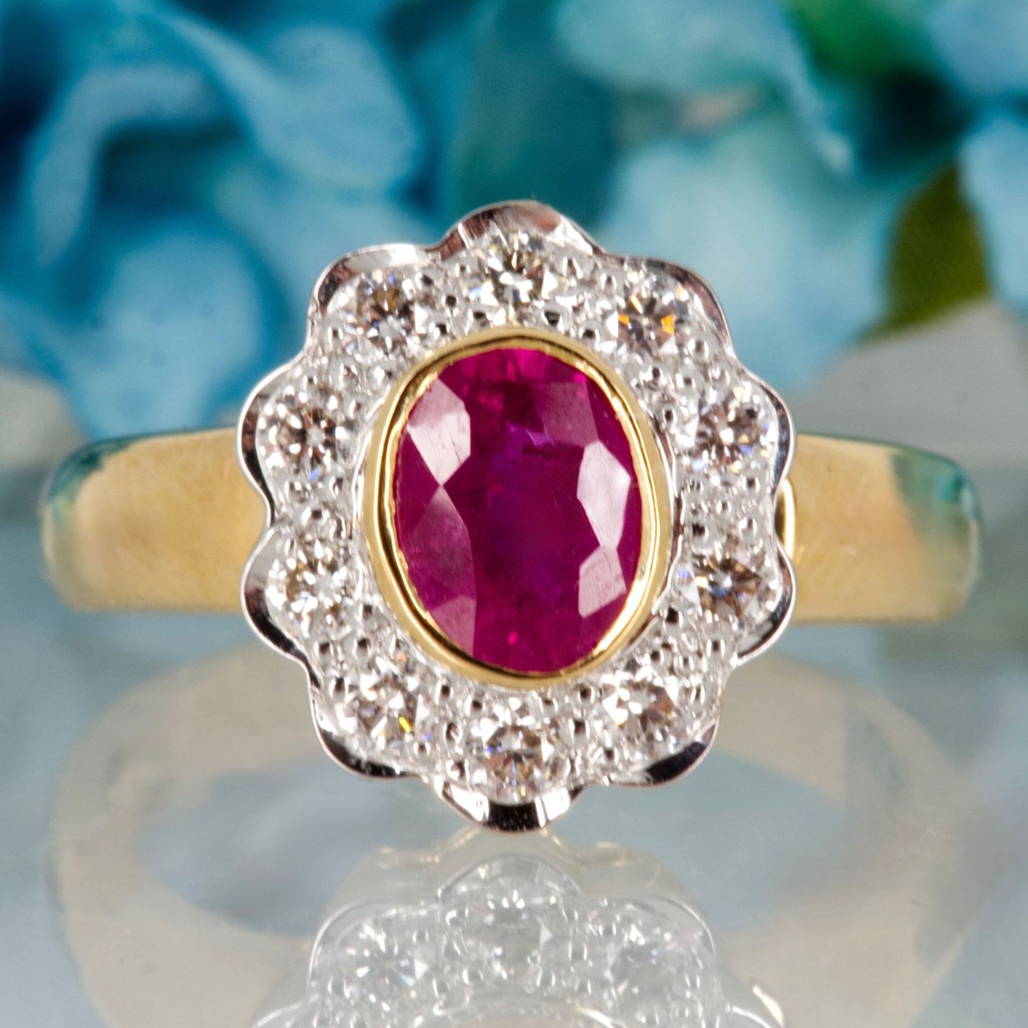 18ct Yellow Gold Oval Cut Ruby & Round Brilliant Cut Diamond Flower Cluster Ring