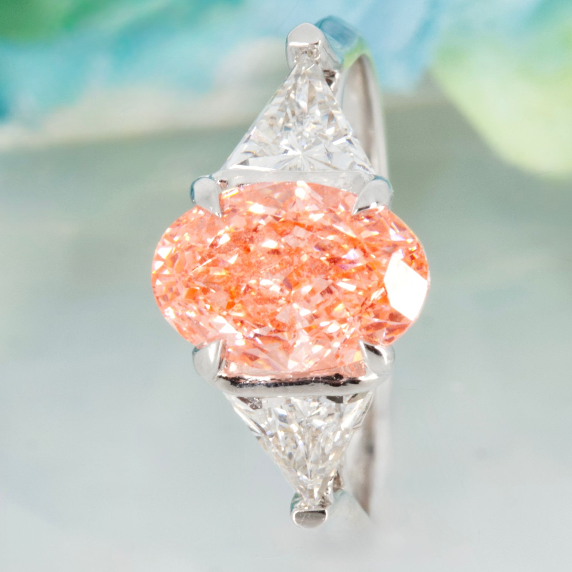 18ct White Gold Oval Cut Lab Grown Pink Diamond & Trilliant Cut Lab Grown Diamond Trilogy Ring