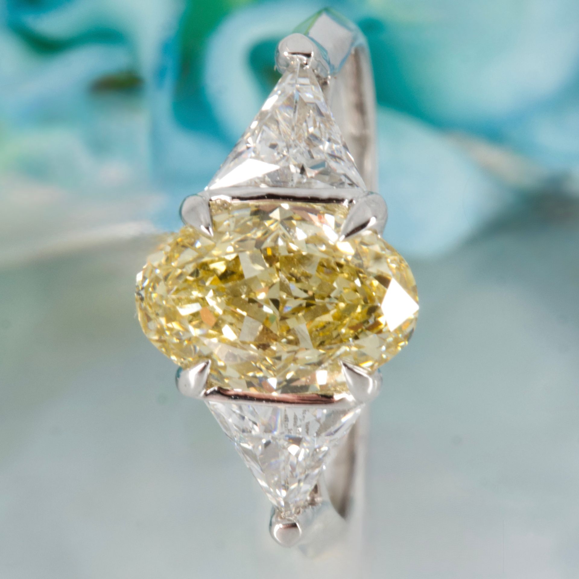 18ct White Gold Oval Cut Lab Grown Yellow Diamond & Trilliant Cut Lab Grown Diamond Trilogy Ring