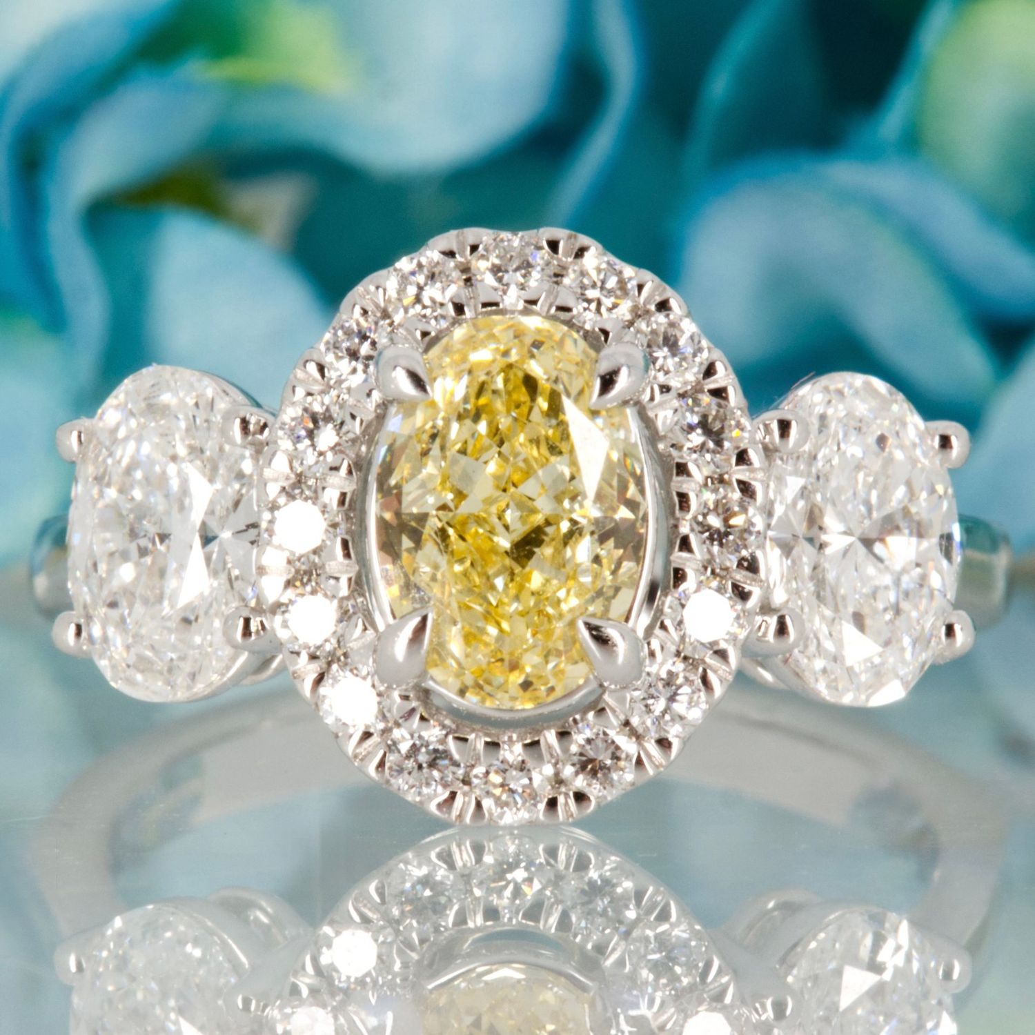 18ct White Gold Oval Cut Lab Grown Yellow Diamond & Lab Grown Diamond Halo Cluster Trilogy Ring