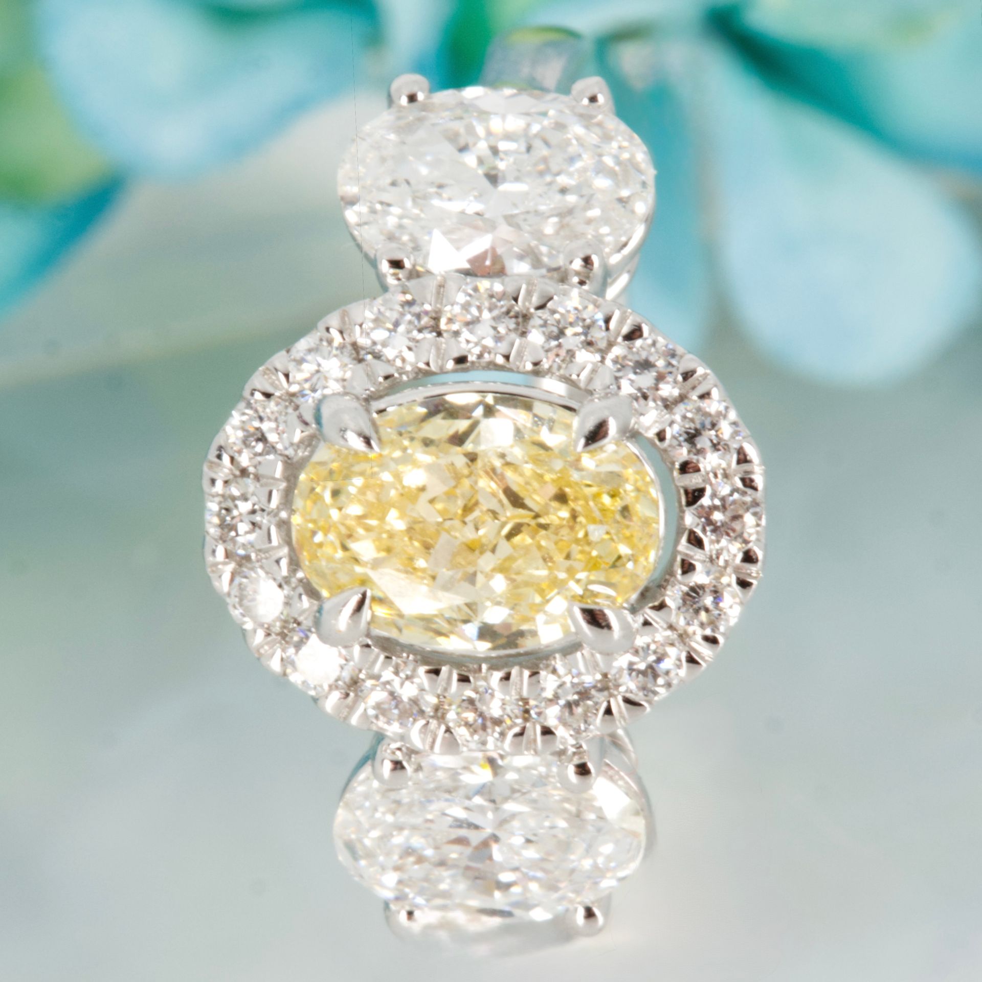 18ct White Gold Oval Cut Lab Grown Yellow Diamond & Lab Grown Diamond Halo Cluster Trilogy Ring