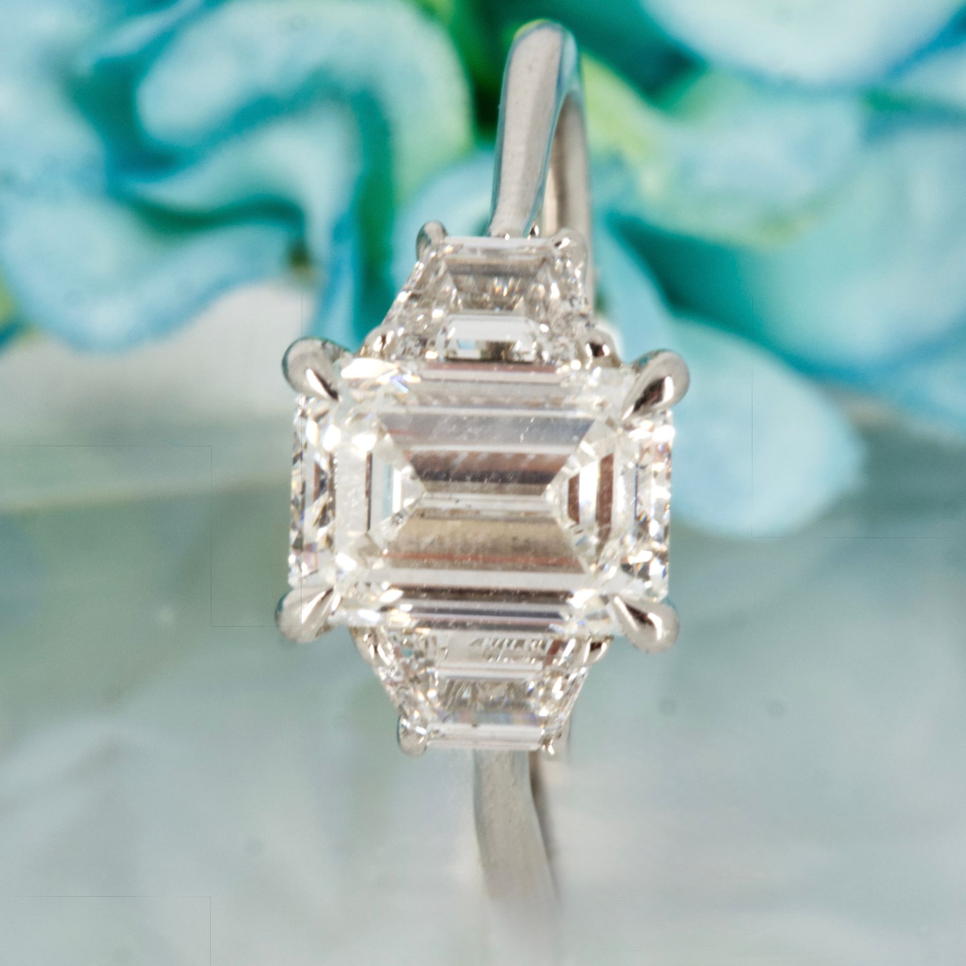 Platinum 2.63ct Emerald & Trapezoid Cut Lab Grown Diamond Trilogy Ring