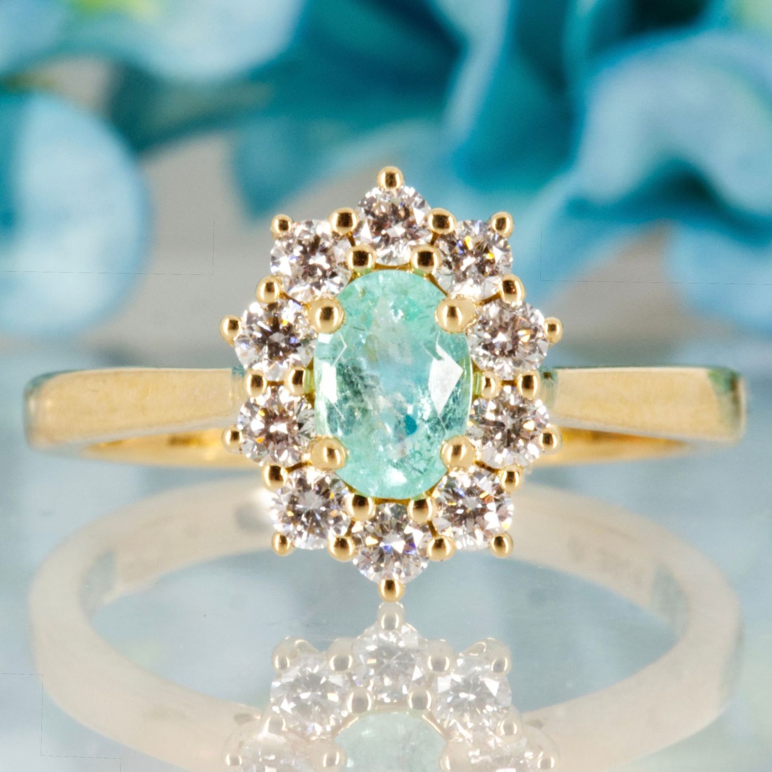 18ct Yellow Gold Oval Cut Paraiba Tourmaline & Round Brilliant Cut Diamond Cluster Ring