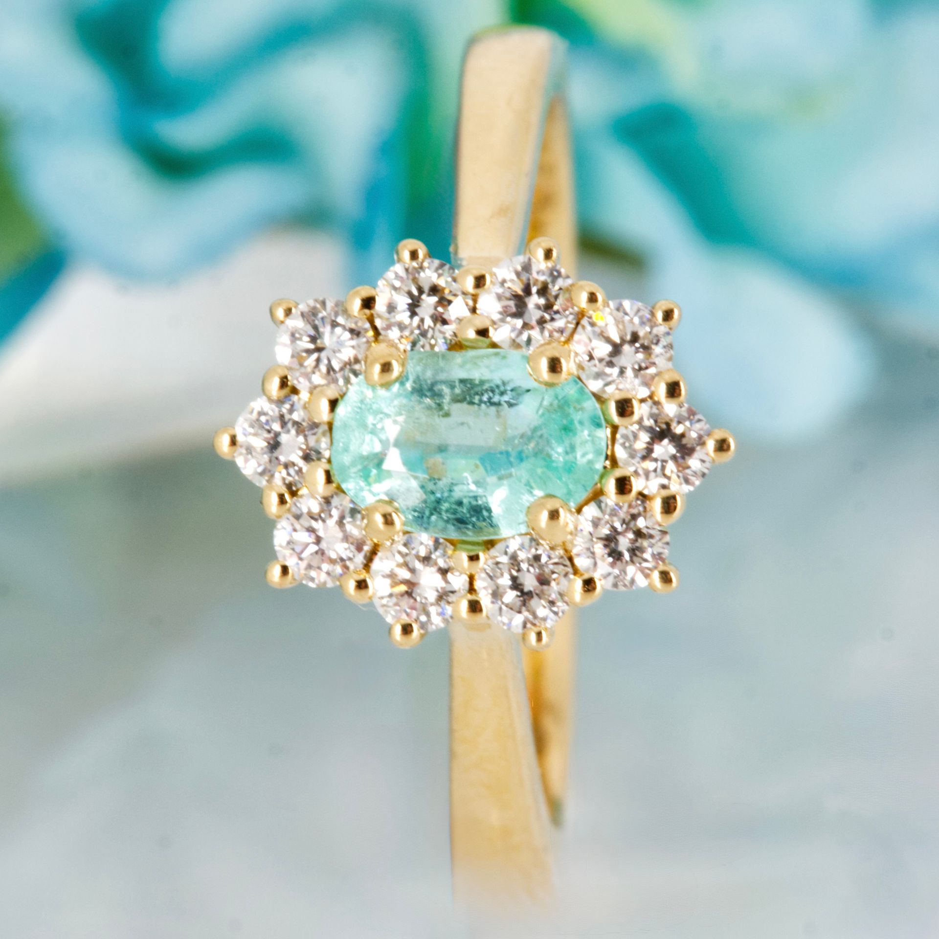 18ct Yellow Gold Oval Cut Paraiba Tourmaline & Round Brilliant Cut Diamond Cluster Ring