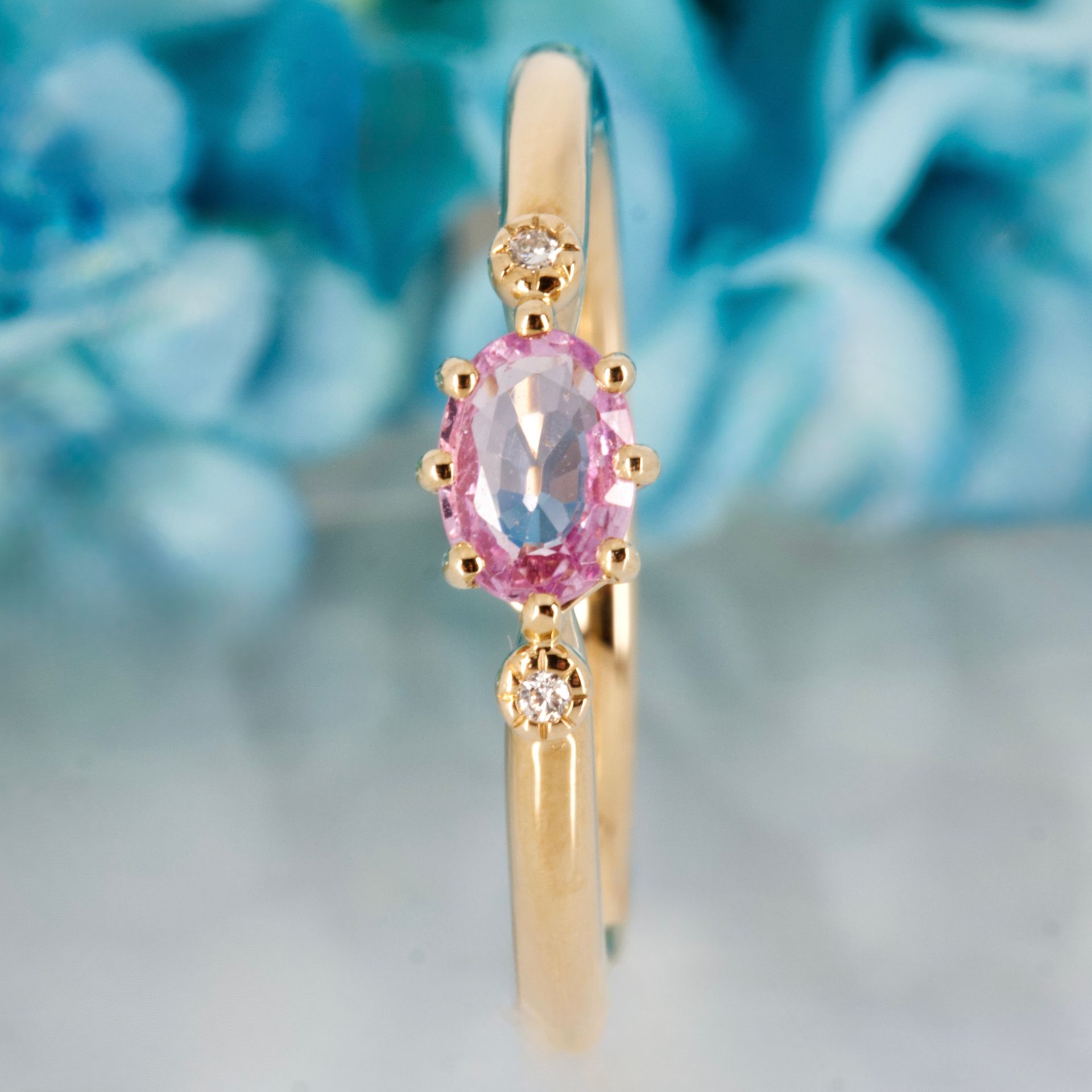 9ct Yellow Gold Oval Cut Pink Sapphire & Round Brilliant Cut Diamond Trilogy Ring