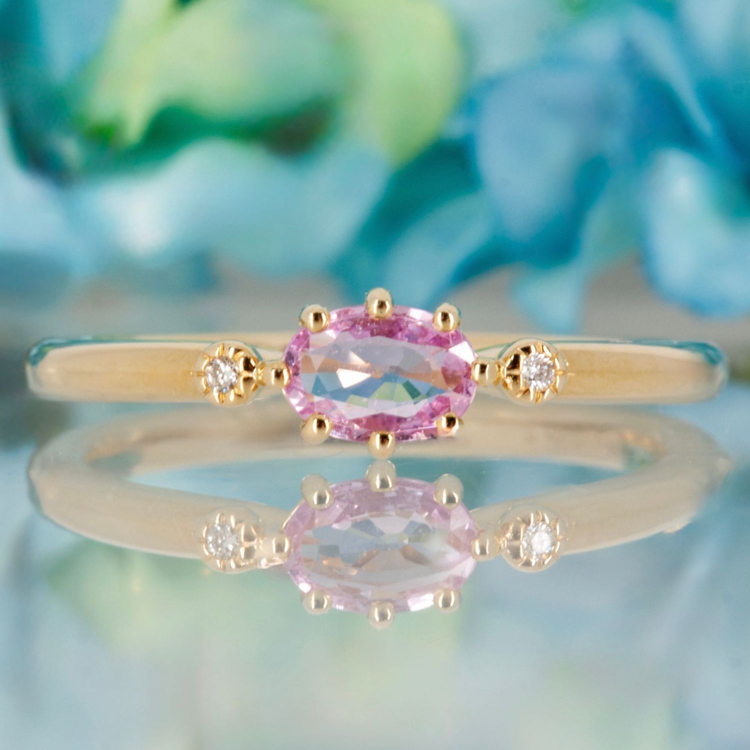 9ct Yellow Gold Oval Cut Pink Sapphire & Round Brilliant Cut Diamond Trilogy Ring