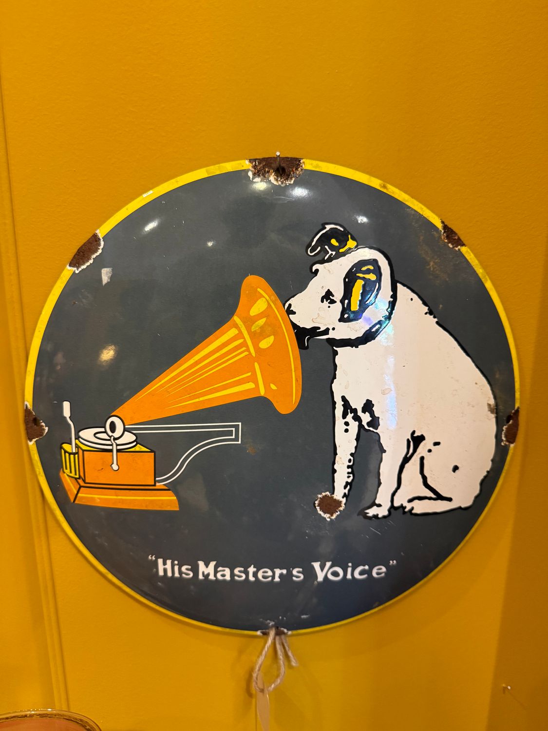 "His Master's Voice" geëmailleerd reclamebord