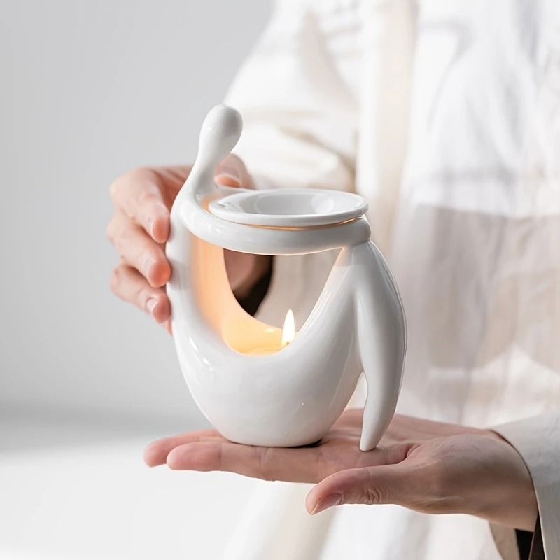 1 Elegant White Ceramic Essential Oil Diffuser with Human Figure Design