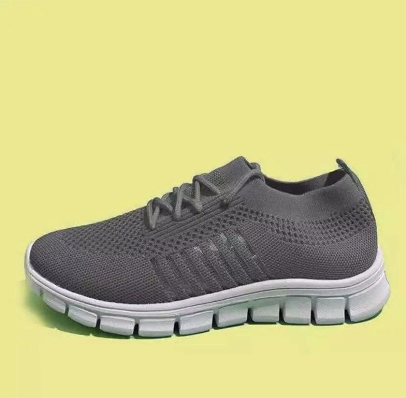 Lace up mesh sports shoes for women’s flat bottomed oversized shoes