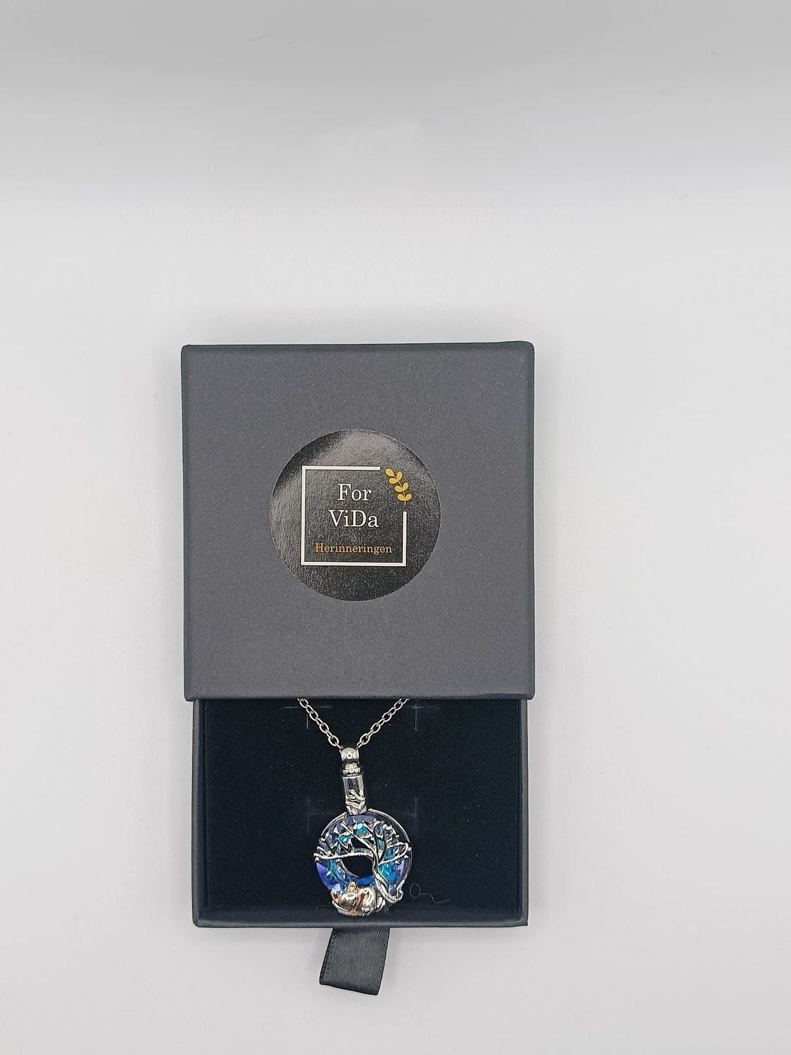 Betoverende asketting met vosje